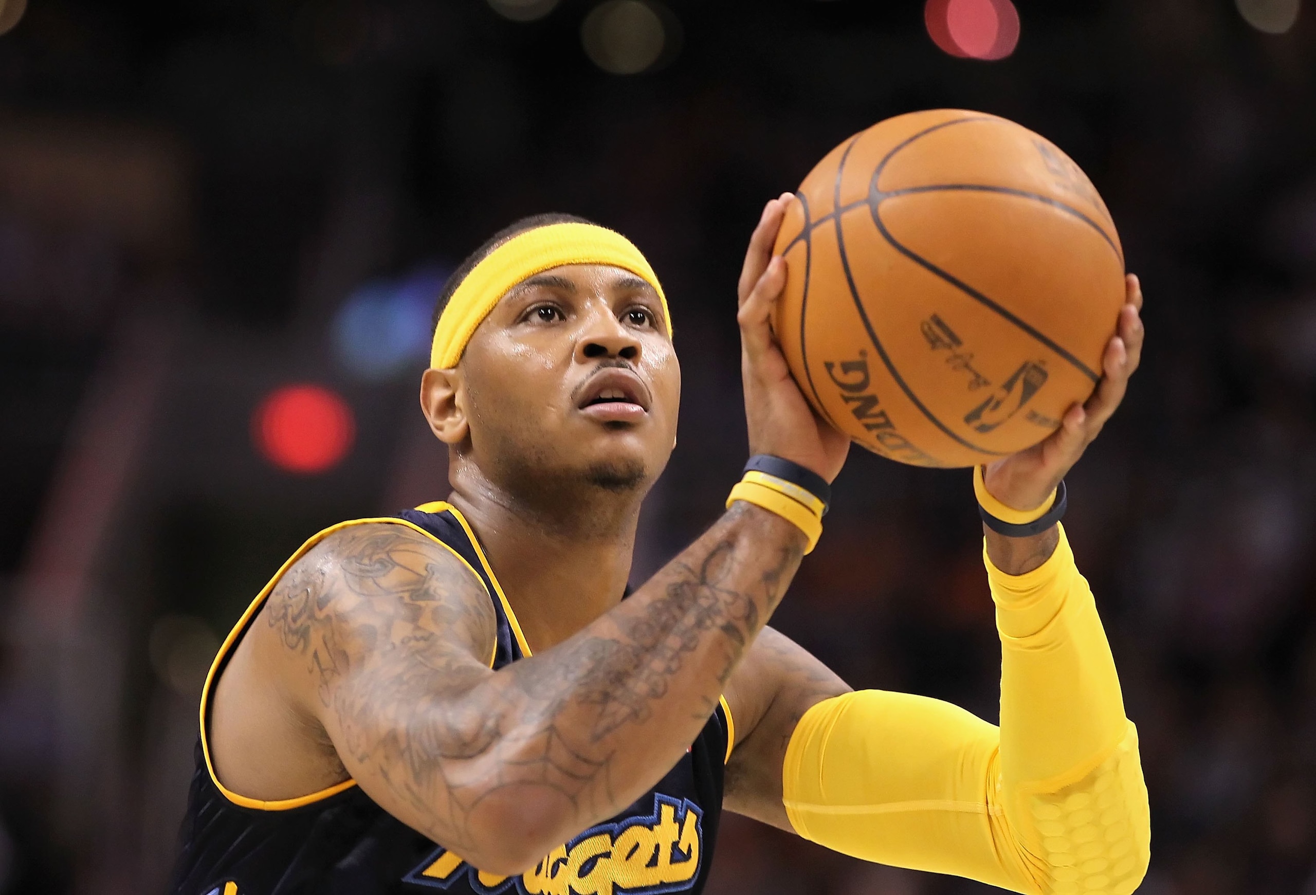 PHOENIX - APRIL 13:  Carmelo Anthony #15 of the Denver Nuggets shoots a free throw shot during the NBA game against the Phoenix Suns at US Airways Center on April 13, 2010 in Phoenix, Arizona. The Suns defeated the Nuggets 123-101.  NOTE TO USER: User exp