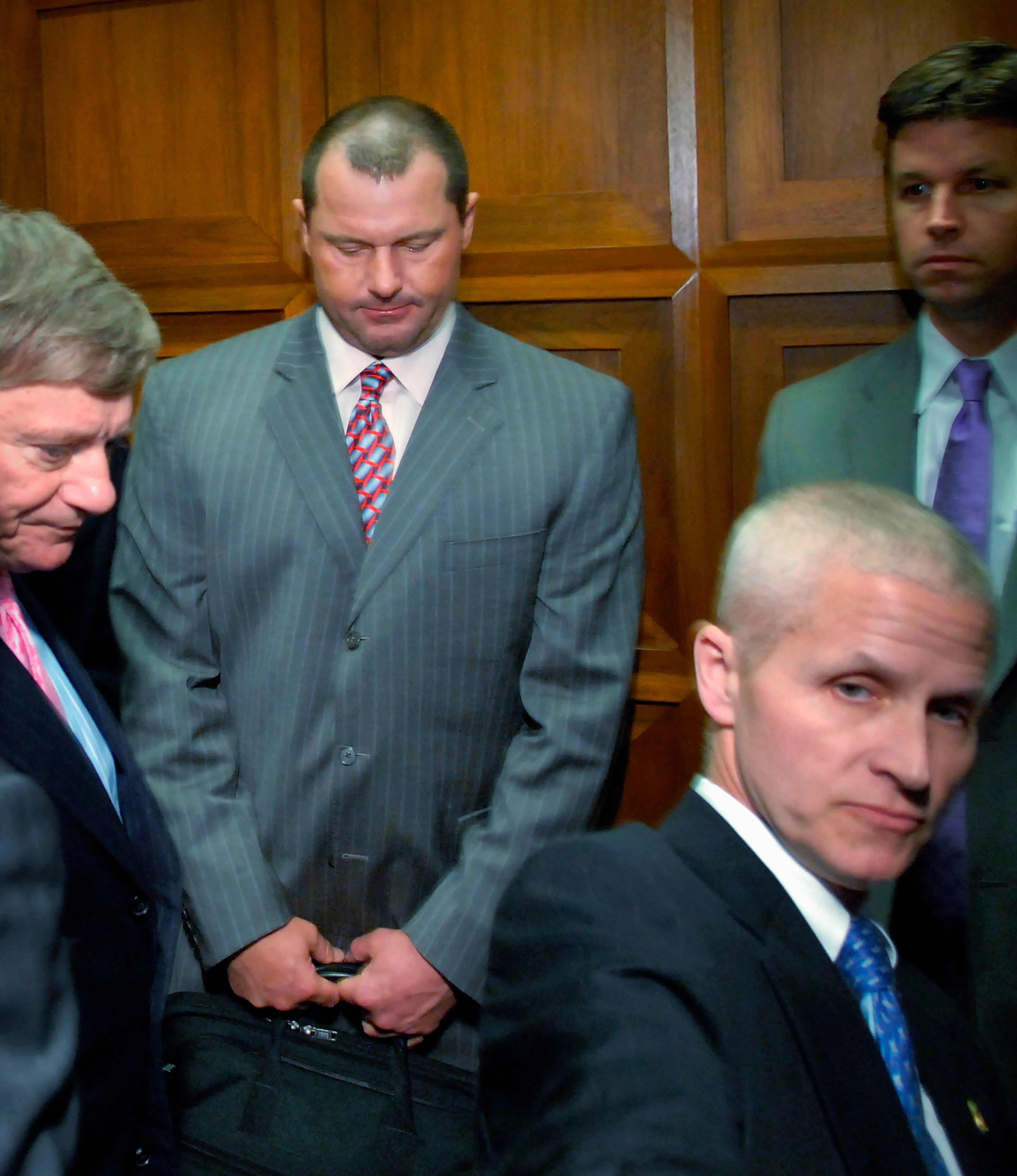 WASHINGTON - FEBRUARY 05:  Former New York Yankees pitcher Roger Clemens (2nd L) departs on an elevator after being deposed by the House Oversight and Government Reform Committee about steroid use in Major League Baseball, February 5, 2008 in Washington.
