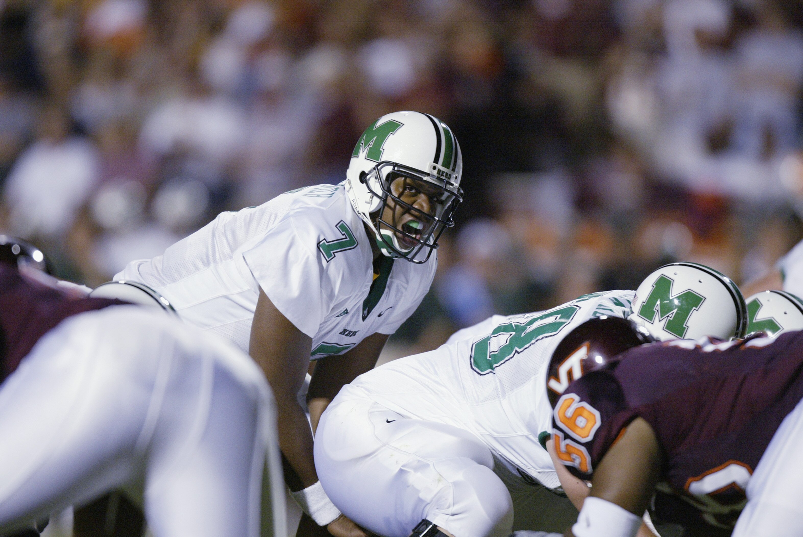 BLACKSBURG, VA - SEPTEMBER 12:  Quarterback Byron Leftwich #7 of the Marshall Thundering Herd calls out the snap count during the NCAA football game against the Virginia Tech Hokies at Lane Stadium on September 12, 2002 in Blacksburg, Virgina.  The Hokies
