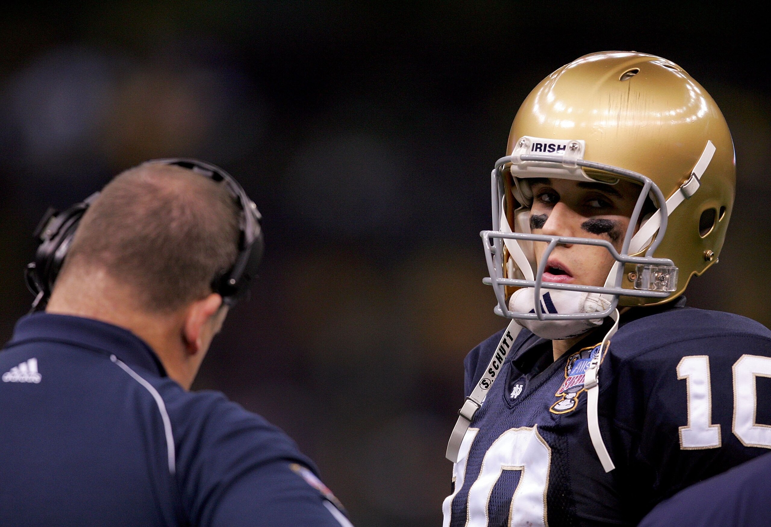 NEW ORLEANS - JANUARY 03:  Quarterback Brady Quinn #10 of the Notre Dame Fighting Irish speaks with head coach Charlie Weis in the second quarter of the 2007 Allstate Sugar Bowl against the LSU Tigers on January 3, 2007 at the Superdome in New Orleans, Lo