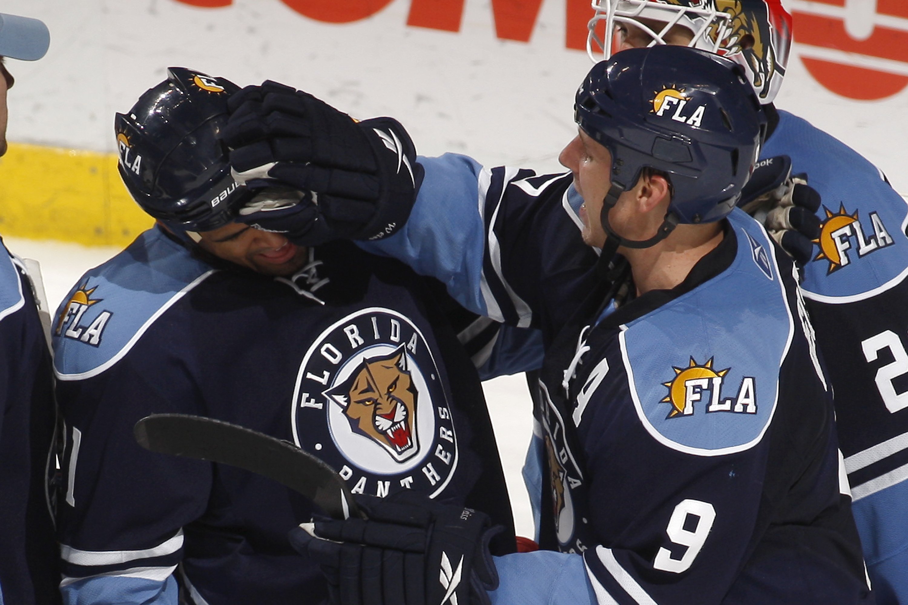 SUNRISE, FL - JANUARY 23: Kenndal McArdle #71 is congratulated by Stephen Weiss #9 of the Florida Panthers for scoring his first goal in the NHL after the game against the Toronto Maple Leafs on January 23, 2010 at the BankAtlantic Center in Sunrise, Flor