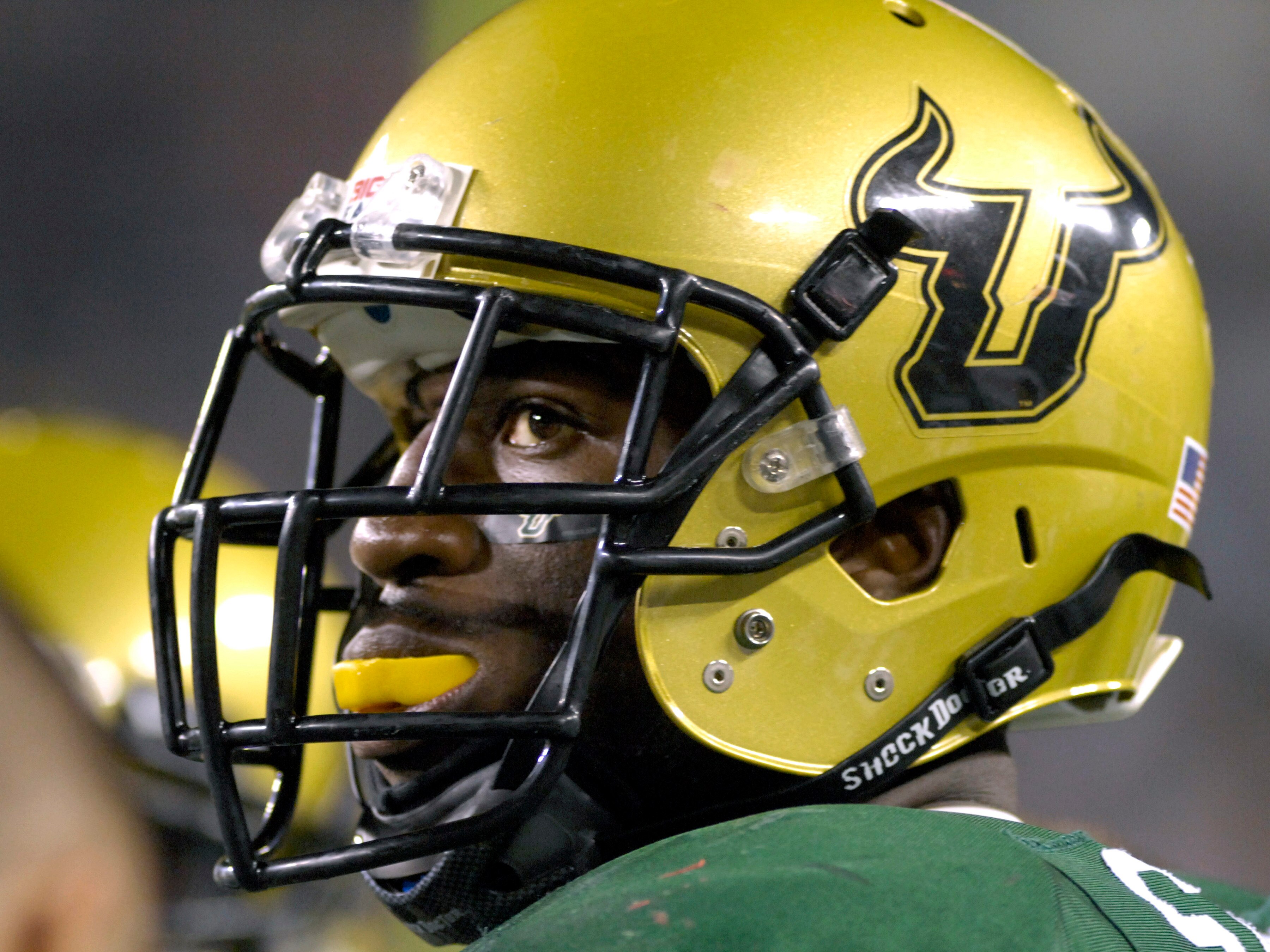 TAMPA, FL - NOVEMBER 17: Defensive end George Selvie #95 of the  University of South Florida Bulls checks the scoreboard against the Louisville Cardinals at Raymond James Stadium on November 17, 2007 in Tampa, Florida. USF won 55 - 17. (Photo by Al Messer