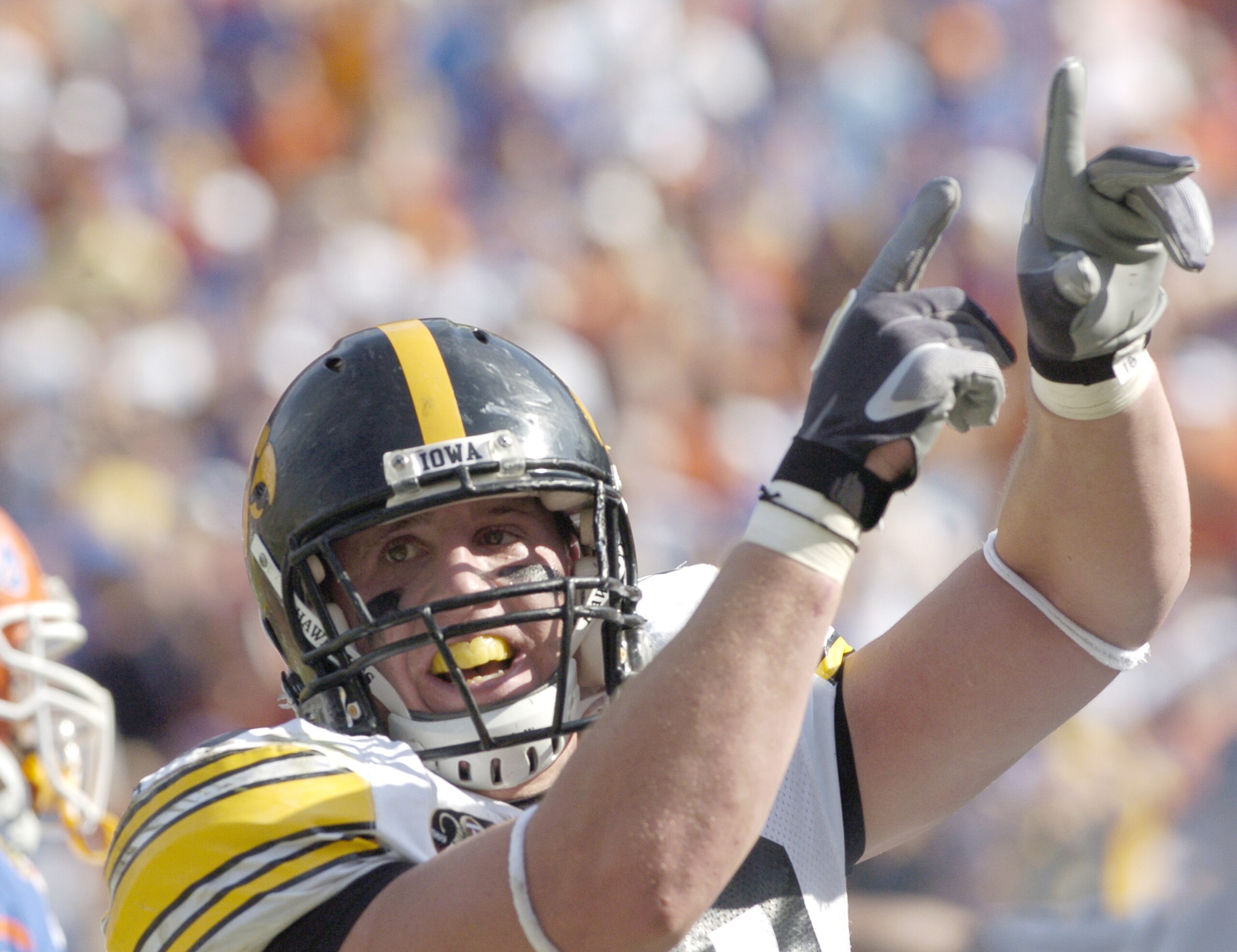 Iowa linebacker Chad Greenway celebrates a defensive stop against Florida in the 2006 Outback Bowl January 2 in Tampa.  Florida defeated Iowa 31 - 24. (Photo by A. Messerschmidt/Getty Images) *** Local Caption ***
