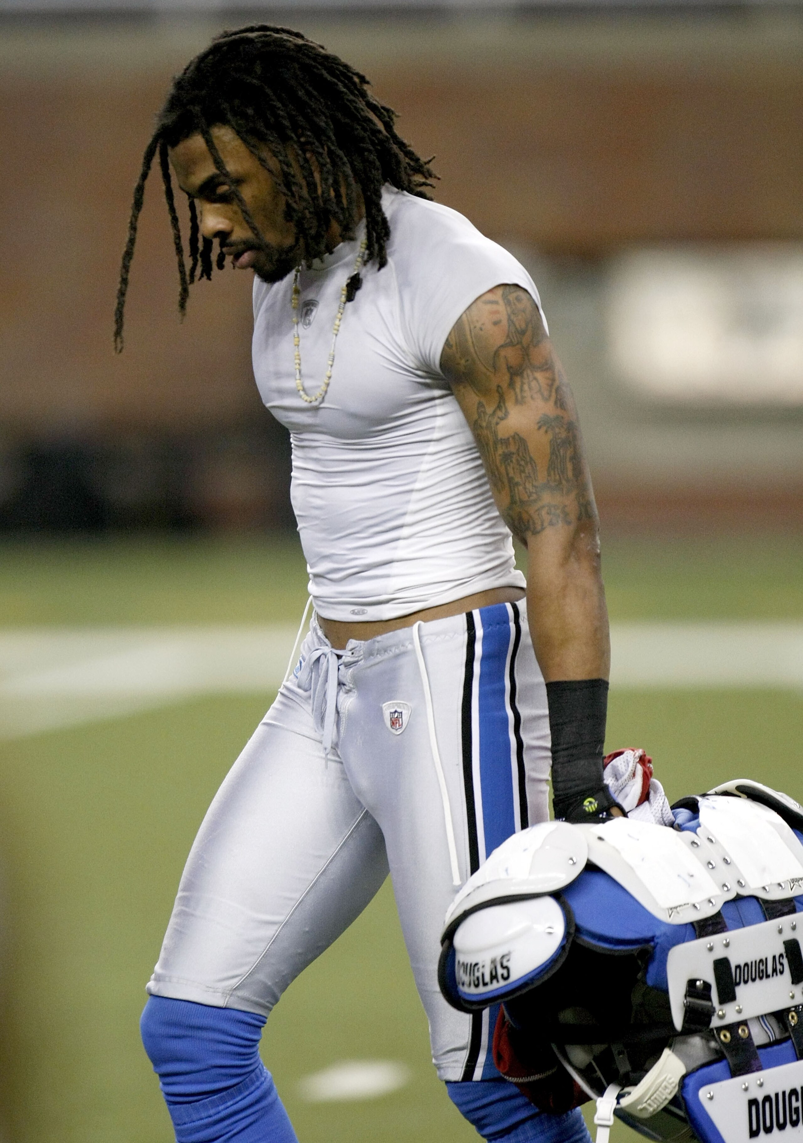 DETROIT - DECEMBER 20:  Louis Delmas #26 the Detroit Lions leaves the field after a 31-24 loss to the Arizona Cardinals on December 20, 2009 at Ford Field in Detroit, Michigan.  (Photo by Gregory Shamus/Getty Images)