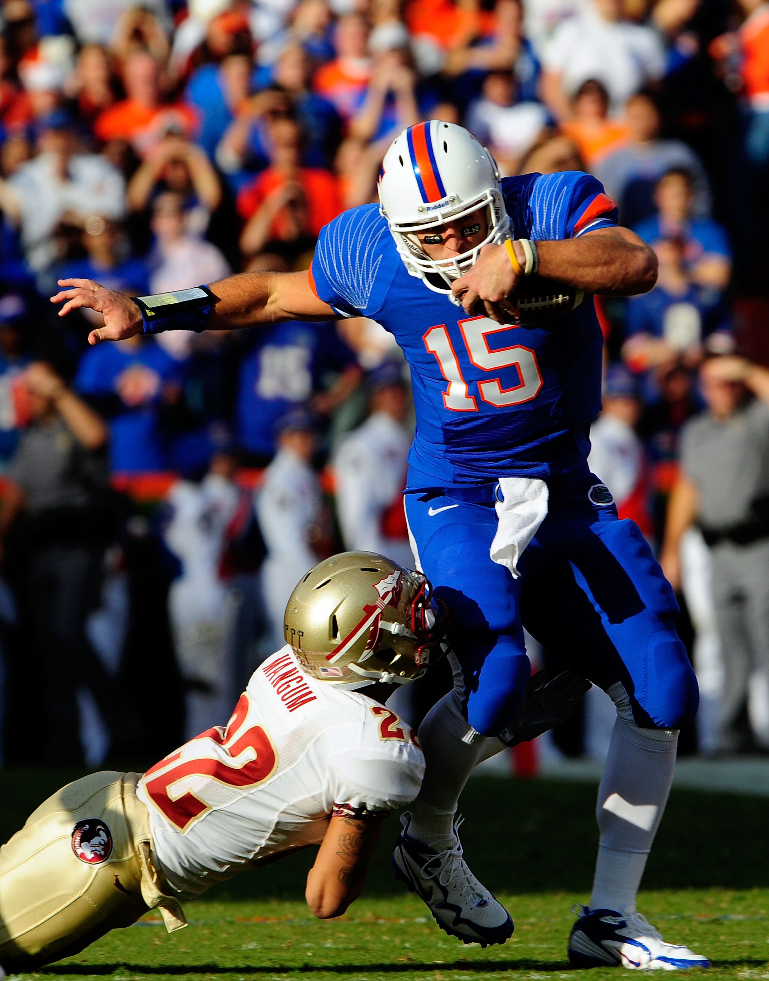 GAINESVILLE, FL - NOVEMBER 28: Tim Tebow #15 of the Florida Gators runs for yardage during the game against the Florida State Seminoles at Ben Hill Griffin Stadium on November 28, 2009 in Gainesville, Florida. (Photo by Sam Greenwood/Getty Images) GAINESVILLE, FL - NOVEMBER 28: Tim Tebow #15 of the Florida Gators runs for yardage during the game against the Florida State Seminoles at Ben Hill Griffin Stadium on November 28, 2009 in Gainesville, Florida. (Photo by Sam Greenwood/Getty Images)