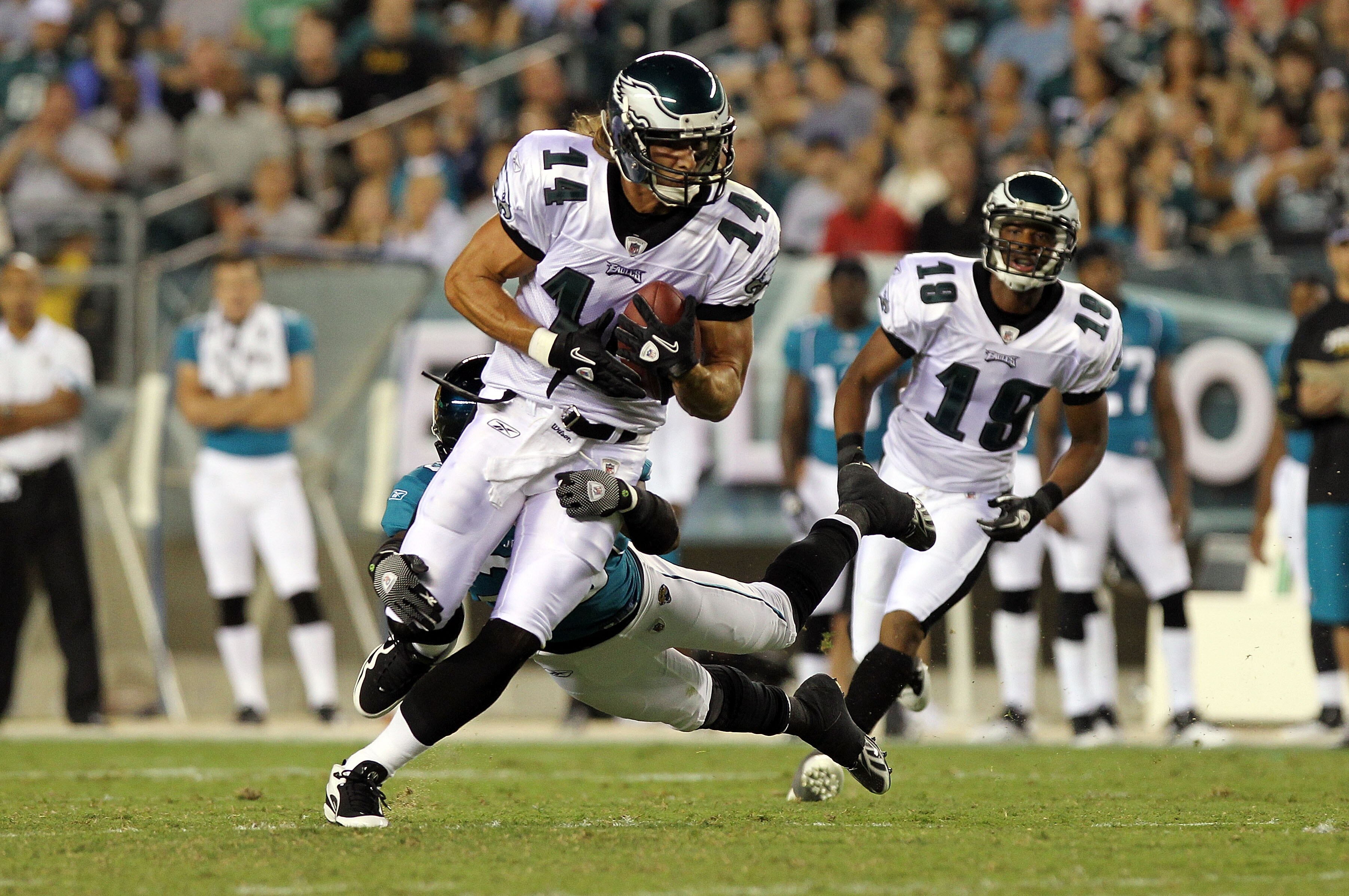 PHILADELPHIA - AUGUST 13: Riley Cooper #14 of the Philadelphia Eagles is tackled by William Middleton #29 of the Jacksonville Jaguars during their preseason game at Lincoln Financial Field on August 13, 2010 in Philadelphia, Pennsylvania.  (Photo by Nick 