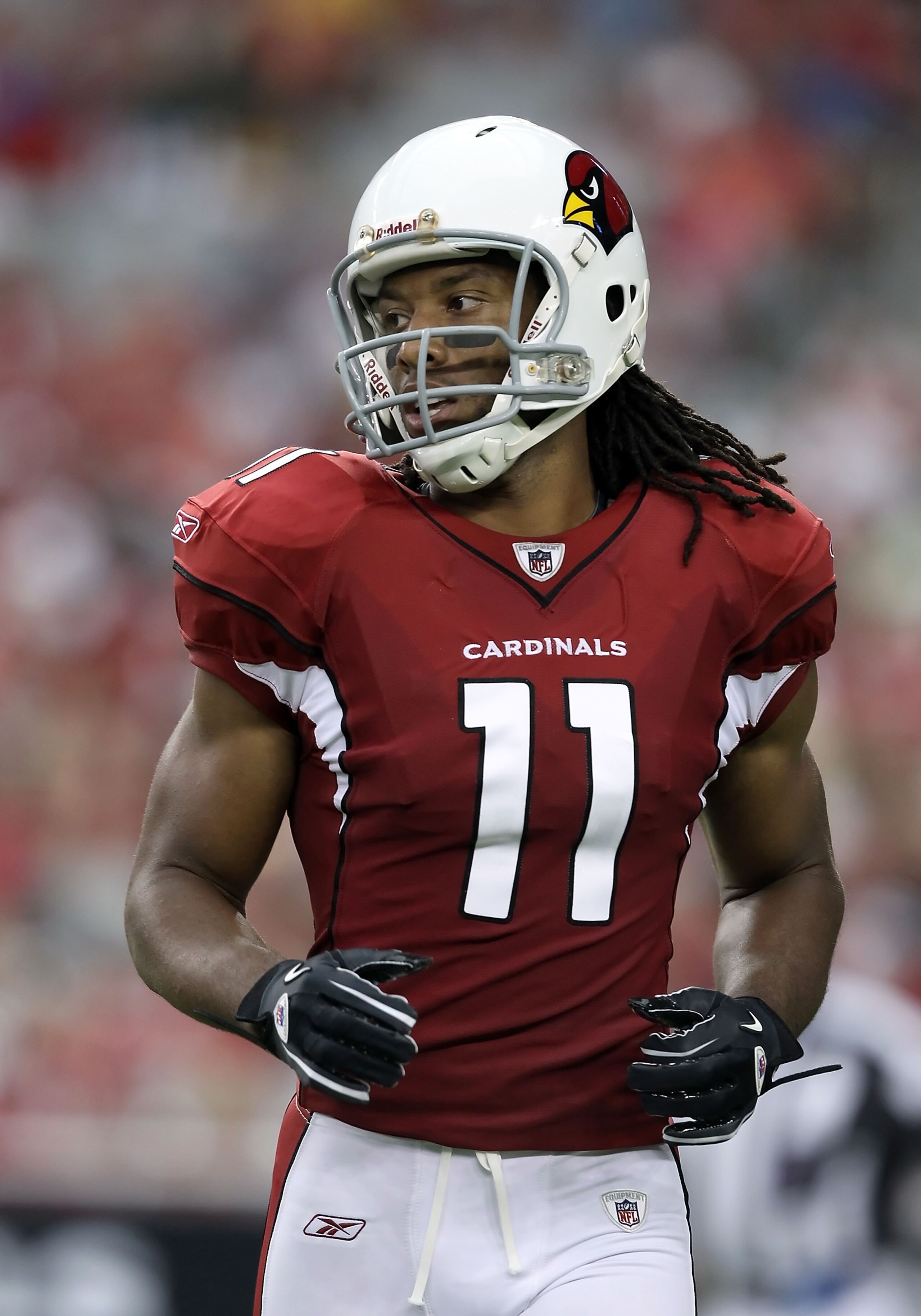 GLENDALE, AZ - AUGUST 14:  Wide receiver Larry Fitzgerald #11 of the Arizona Cardinals during preseason NFL game against the Houston Texans at the University of Phoenix Stadium on August 14, 2010 in Glendale, Arizona.  The Cardinals defeated the Texans 19