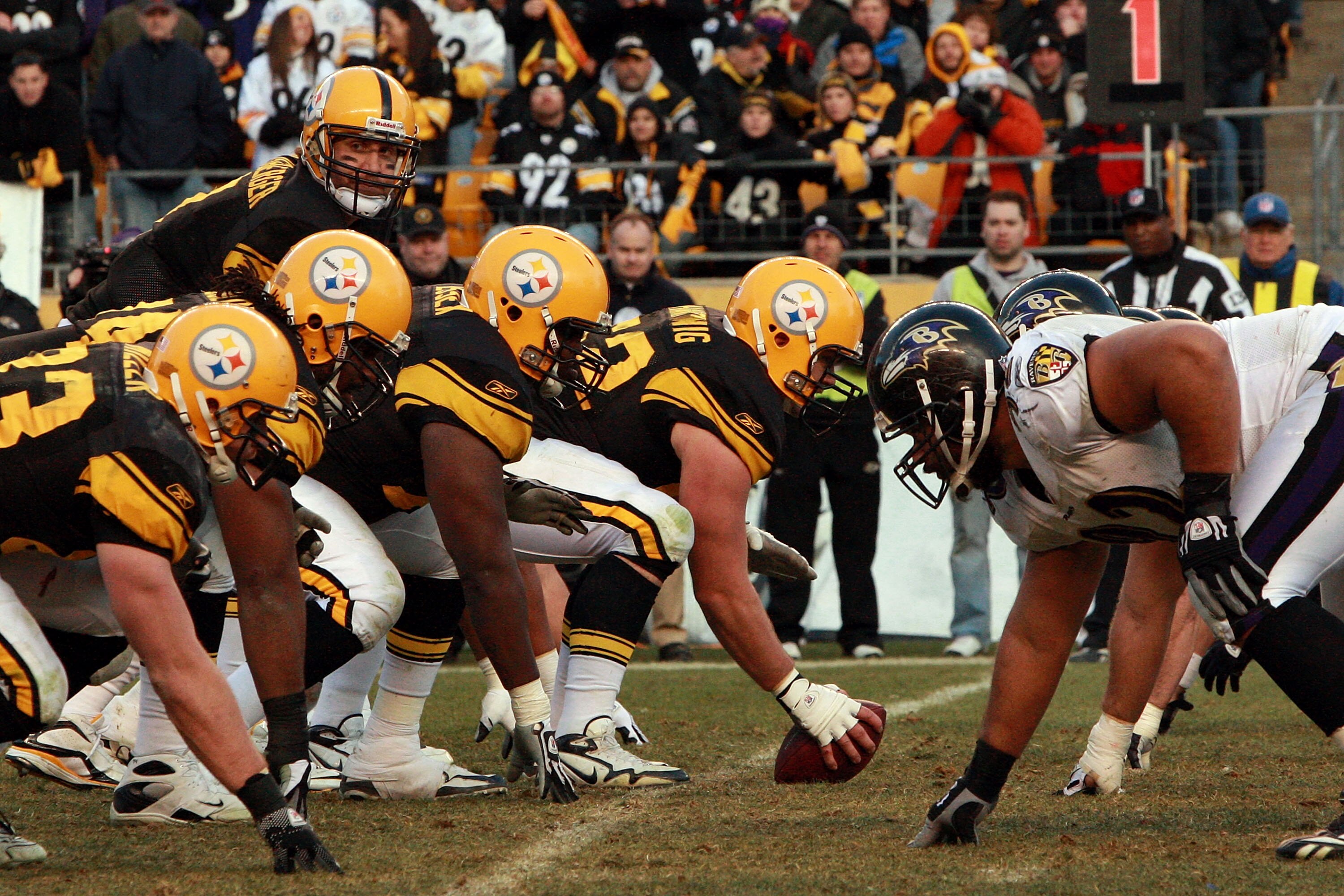 PITTSBURGH - DECEMBER 27:  Ben Roethlisberger #7 of the Pittsburgh Steelers lines up under teammate center Justin Hartwig #62 before the snap during the game against the Baltimore Ravens at Heinz Field on December 27, 2009 in Pittsburgh, Pennsylvania.  (P