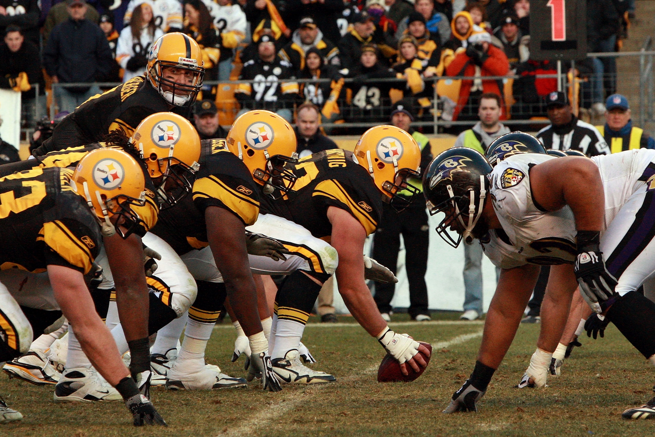 PITTSBURGH - DECEMBER 27: Ben Roethlisberger #7 of the Pittsburgh Steelers lines up under teammate center Justin Hartwig #62 before the snap during the game against the Baltimore Ravens at Heinz Field on December 27, 2009 in Pittsburgh, Pennsylvania. (P PITTSBURGH - DECEMBER 27: Ben Roethlisberger #7 of the Pittsburgh Steelers lines up under teammate center Justin Hartwig #62 before the snap during the game against the Baltimore Ravens at Heinz Field on December 27, 2009 in Pittsburgh, Pennsylvania. (P