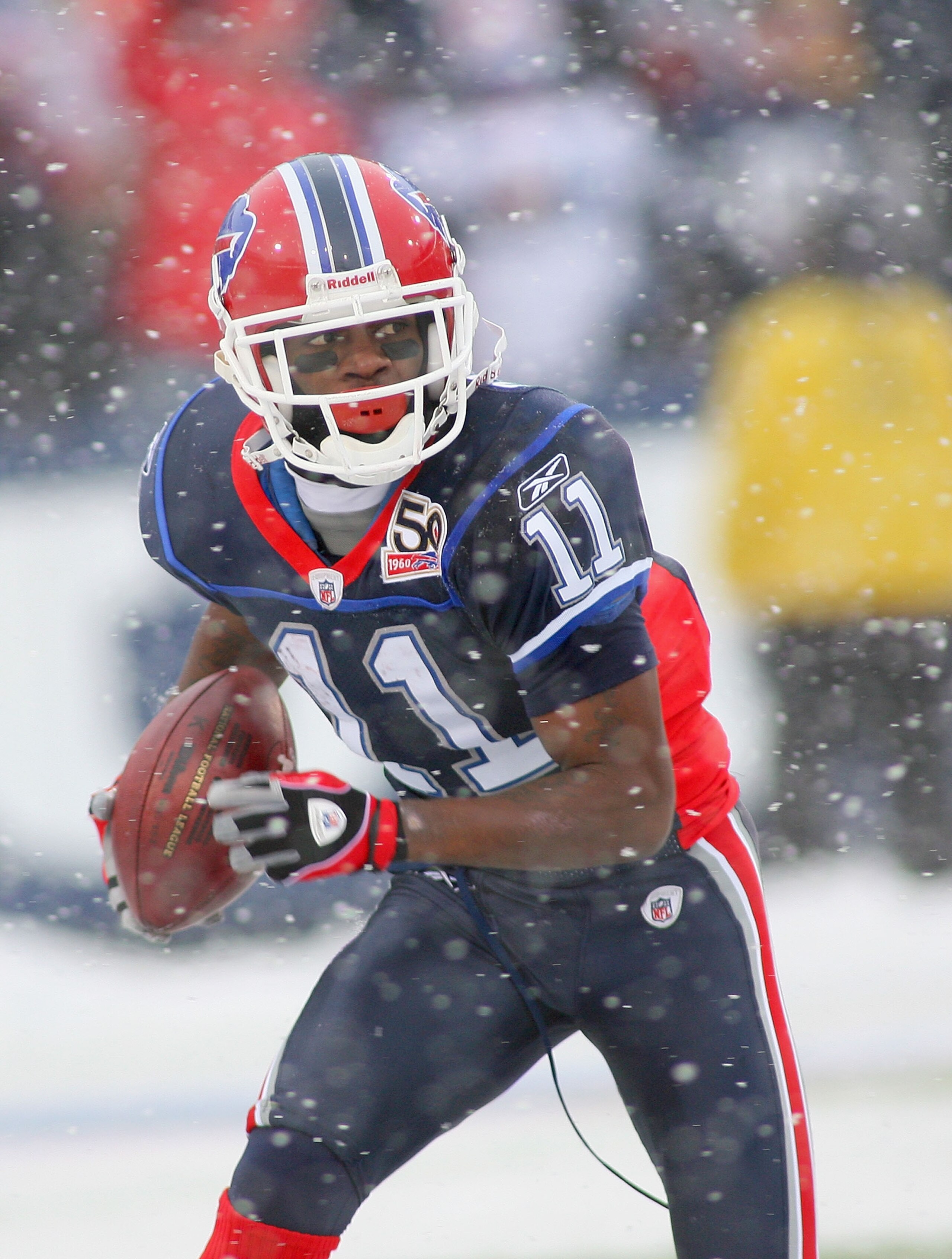 ORCHARD PARK, NY - JANUARY 03: Roscoe Parrish #11 of the Buffalo Bills returns a punt against the Indianapolis Colts at Ralph Wilson Stadium on January 3, 2010 in Orchard Park, New York. Buffalo won 30-7. (Photo by Rick Stewart/Getty Images)