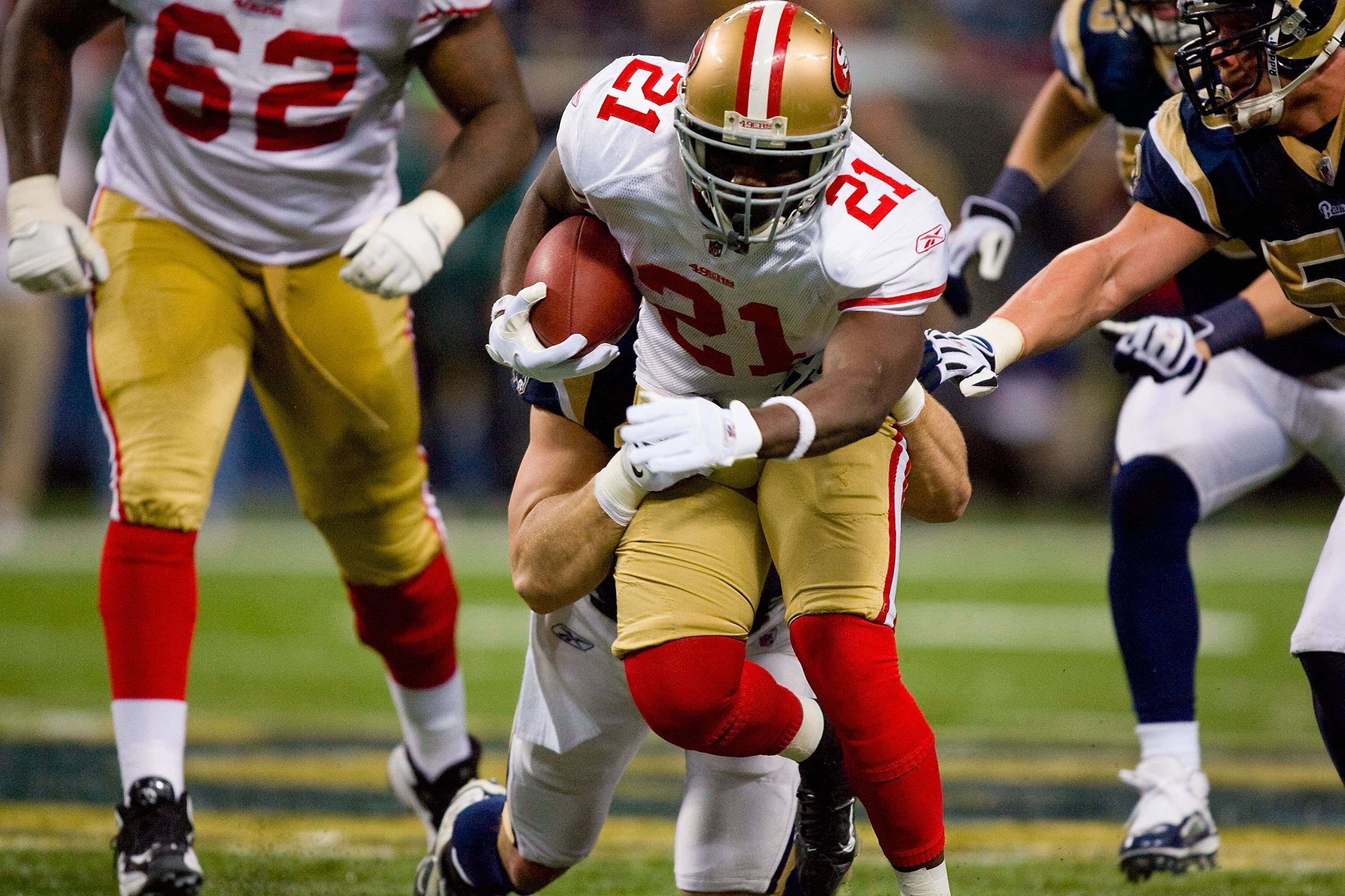 ST. LOUIS - JANUARY 3:  Frank Gore #21 of the San Francisco 49ers carries the ball during the game against the St. Louis Rams at the Edward Jones Dome on January 3, 2010 in St. Louis, Missouri.  The 49ers beat the Rams 28-6.  (Photo by Dilip Vishwanat/Get