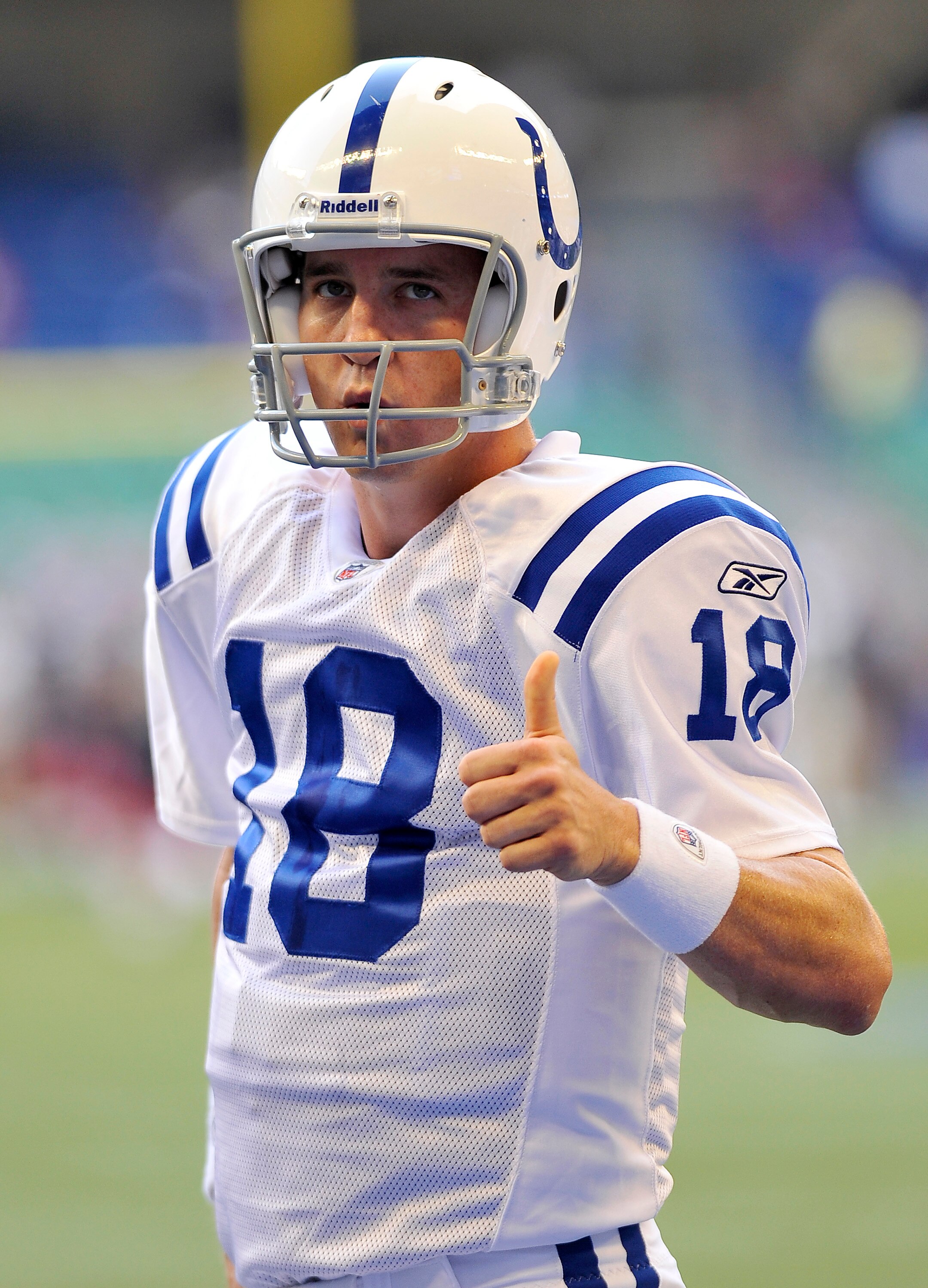 TORONTO - AUGUST 19:  Peyton Manning #18 of the Indianapolis Colts gives the thumbs up to the crowd prior to game action against the Buffalo Bills August 19, 2010 at Rogers Centre in Toronto, Ontario, Canada. (Photo by Brad White/Getty Images)