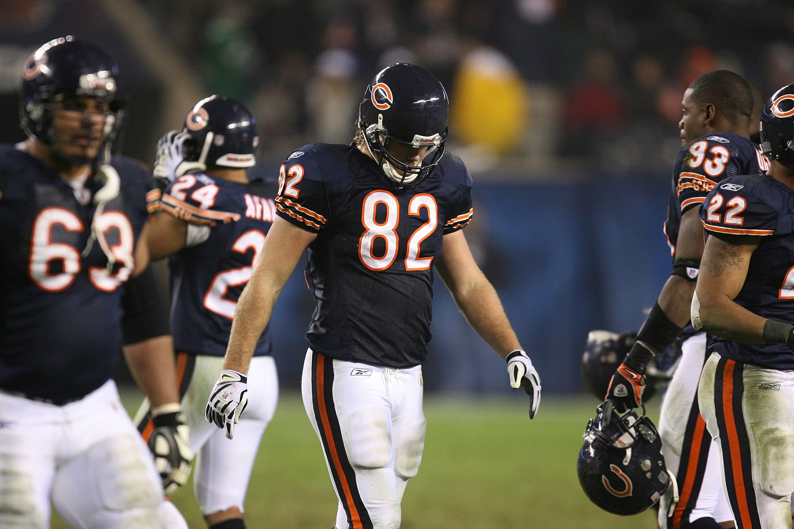CHICAGO - NOVEMBER 22: Greg Olsen #82 of the Chicago Bears walks off the field with teammates at the end of the Bears' last offensive series against the Philadelphia Eagles at Soldier Field on November 22, 2009 in Chicago, Illinois. The Eagles defeated th CHICAGO - NOVEMBER 22: Greg Olsen #82 of the Chicago Bears walks off the field with teammates at the end of the Bears' last offensive series against the Philadelphia Eagles at Soldier Field on November 22, 2009 in Chicago, Illinois. The Eagles defeated th