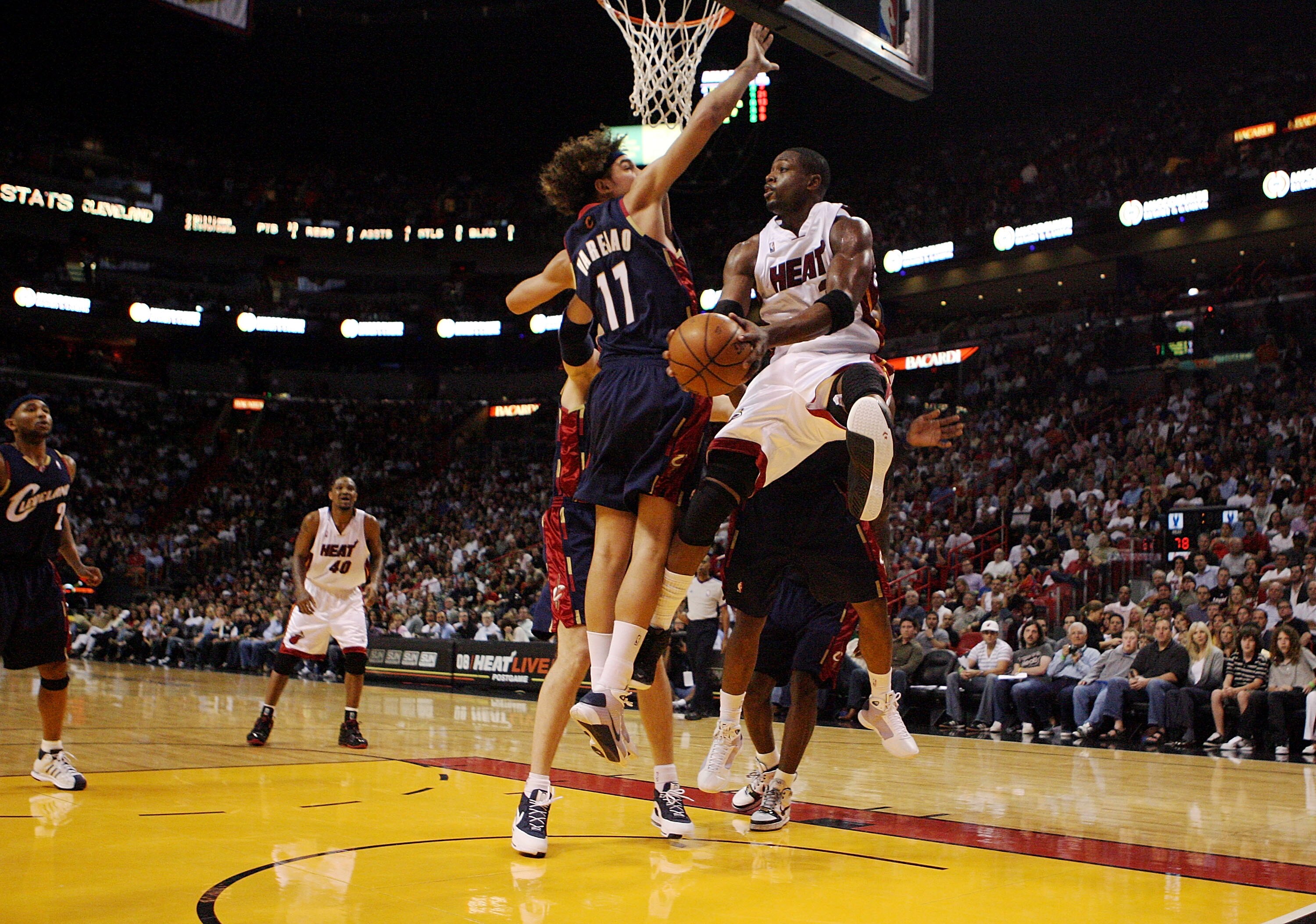 MIAMI - DECEMBER 30: Dwyane Wade #3 of the Miami Heat drives past Anderson Verajao #17 of the Cleveland Cavaliers at American Airlines Arena on December 30, 2008 in Miami, Florida. The Heat defeated the Cavaliers 104-95. NOTE TO USER: User expressly ackno