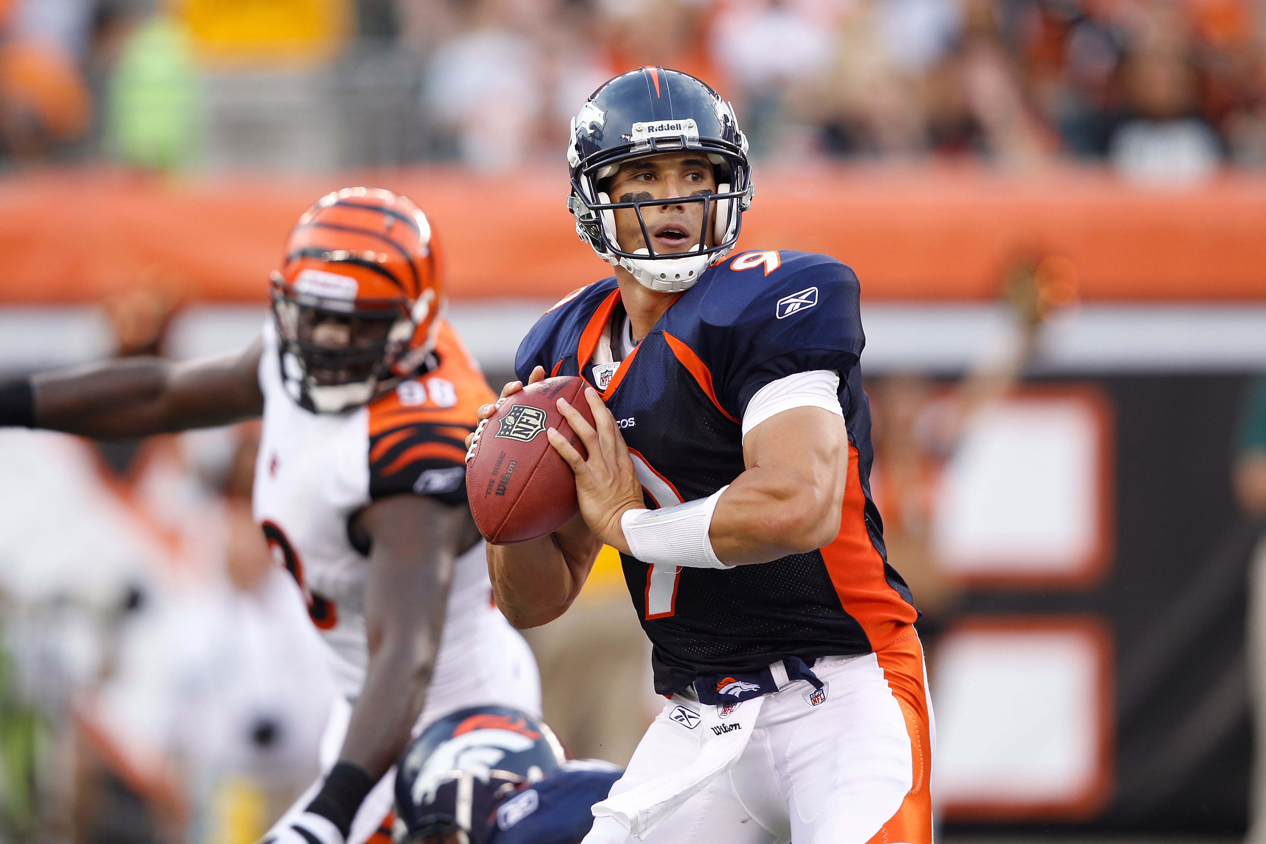 CINCINNATI, OH - AUGUST 15: Brady Quinn #9 of the Denver Broncos looks to pass against the Cincinnati Bengals during a preseason game at Paul Brown Stadium on August 15, 2010 in Cincinnati, Ohio. The Bengals won 33-24. (Photo by Joe Robbins/Getty Images)