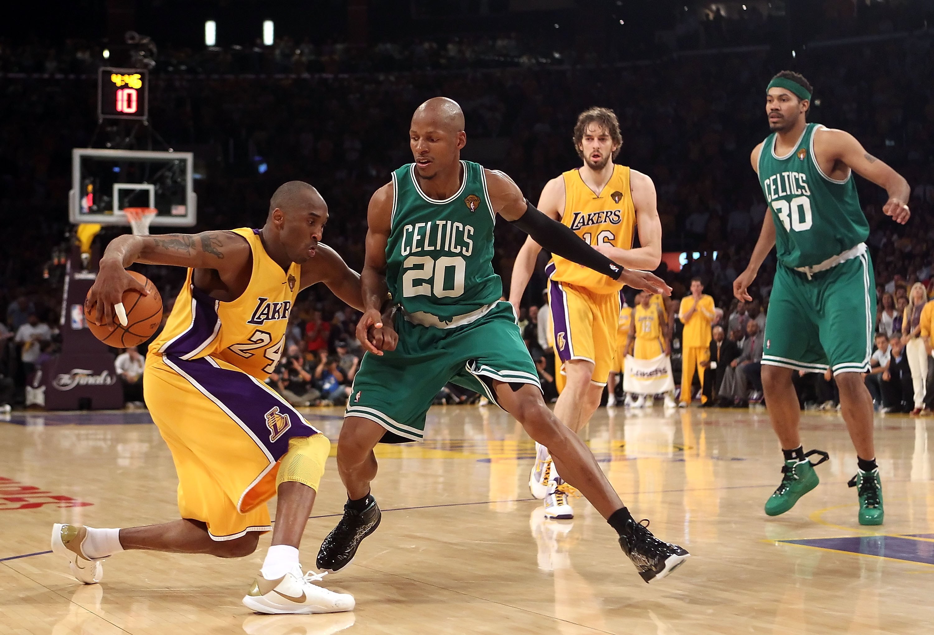 LOS ANGELES, CA - JUNE 17:  Kobe Bryant #24 of the Los Angeles Lakers handles the ball under pressure from Ray Allen #20 of the Boston Celtics in Game Seven of the 2010 NBA Finals at Staples Center on June 17, 2010 in Los Angeles, California. The Lakers d