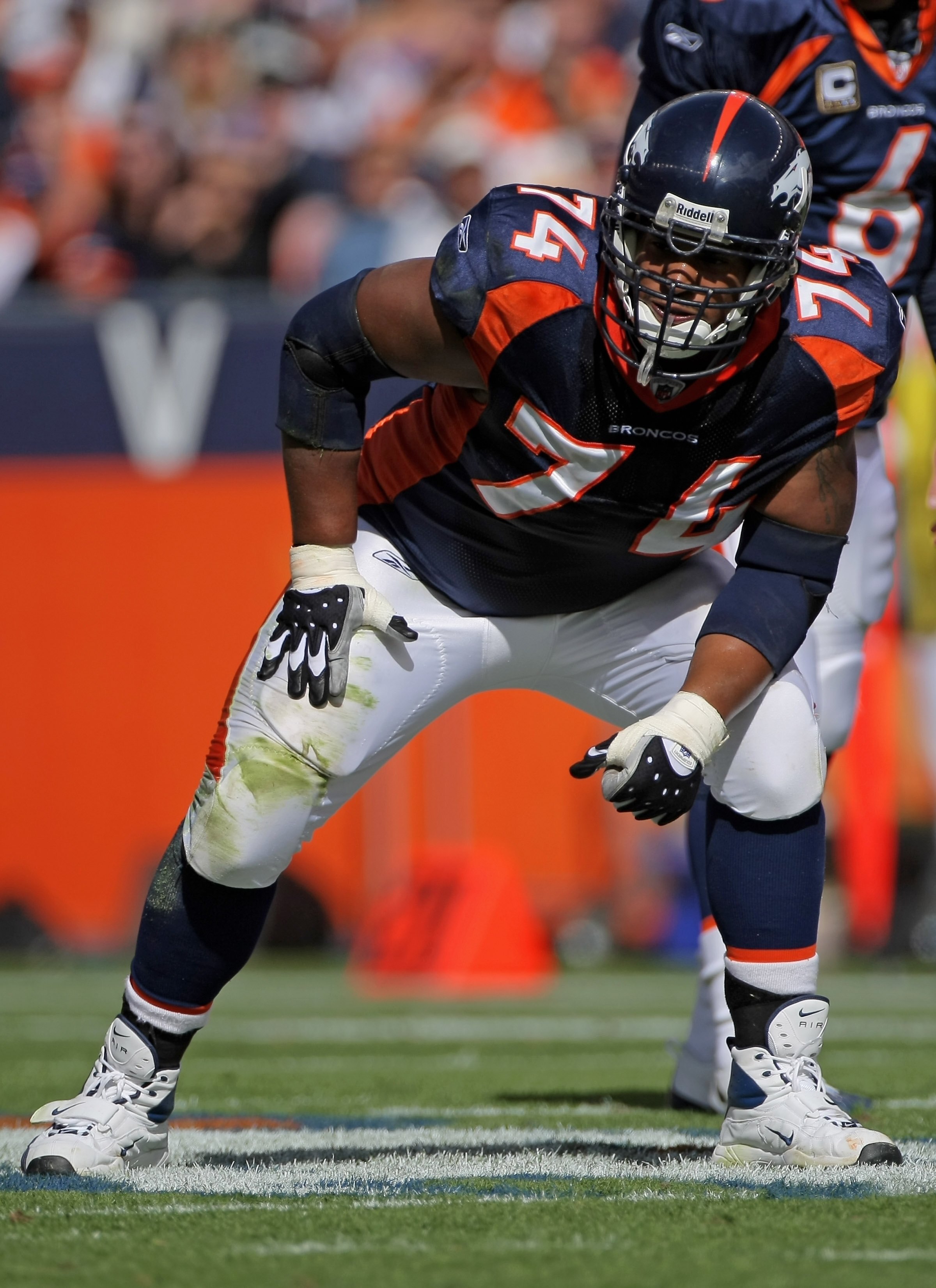 DENVER - OCTOBER 05:  Offensive tackle Ryan Harris #74 of the Denver Broncos lines up against the Tampa Bay Buccaneers during NFL action on October 5, 2008 in Denver, Colorado. The Broncos defeated the Buccaneers 16-13.  (Photo by Doug Pensinger/Getty Ima