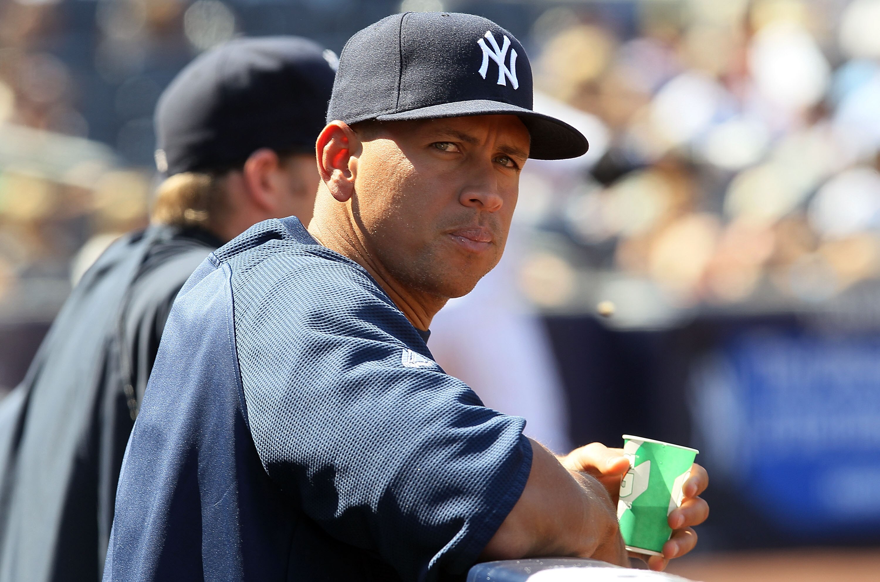 NEW YORK - AUGUST 19:  Alex Rodriguez #13 of the New York Yankees looks on from the dugout against the Detroit Tigers on August 19, 2010 at Yankee Stadium in the Bronx borough of New York City.  (Photo by Jim McIsaac/Getty Images)