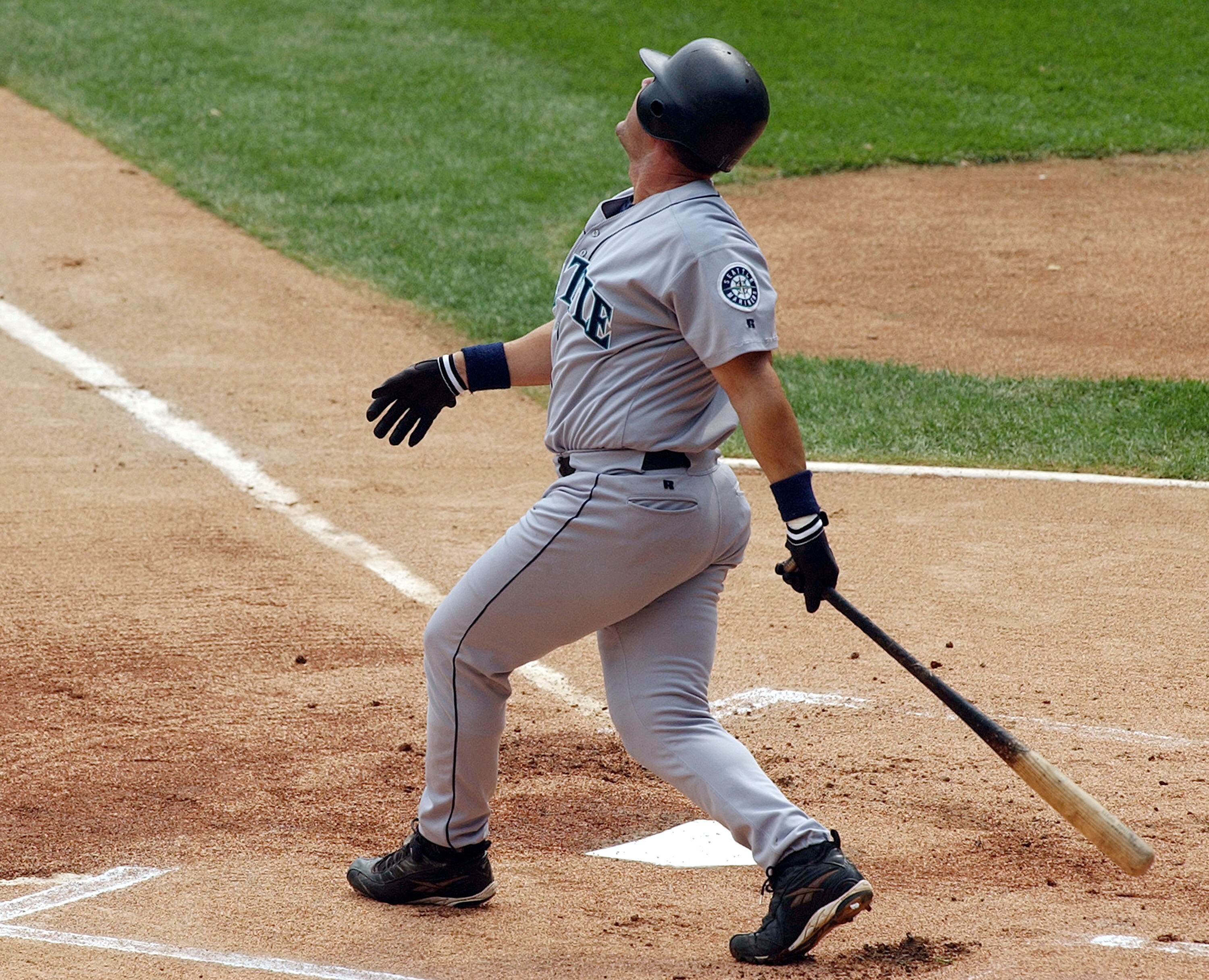 CHICAGO - SEPTEMBER 5:  Edgar Martinez #11 of the Seattle Mariners hits a single in the first inning during his last appearance as a player in Chicago in a game against the White Sox on September 5, 2004 at U.S. Cellular Field in Chicago, Illinois. The Wh