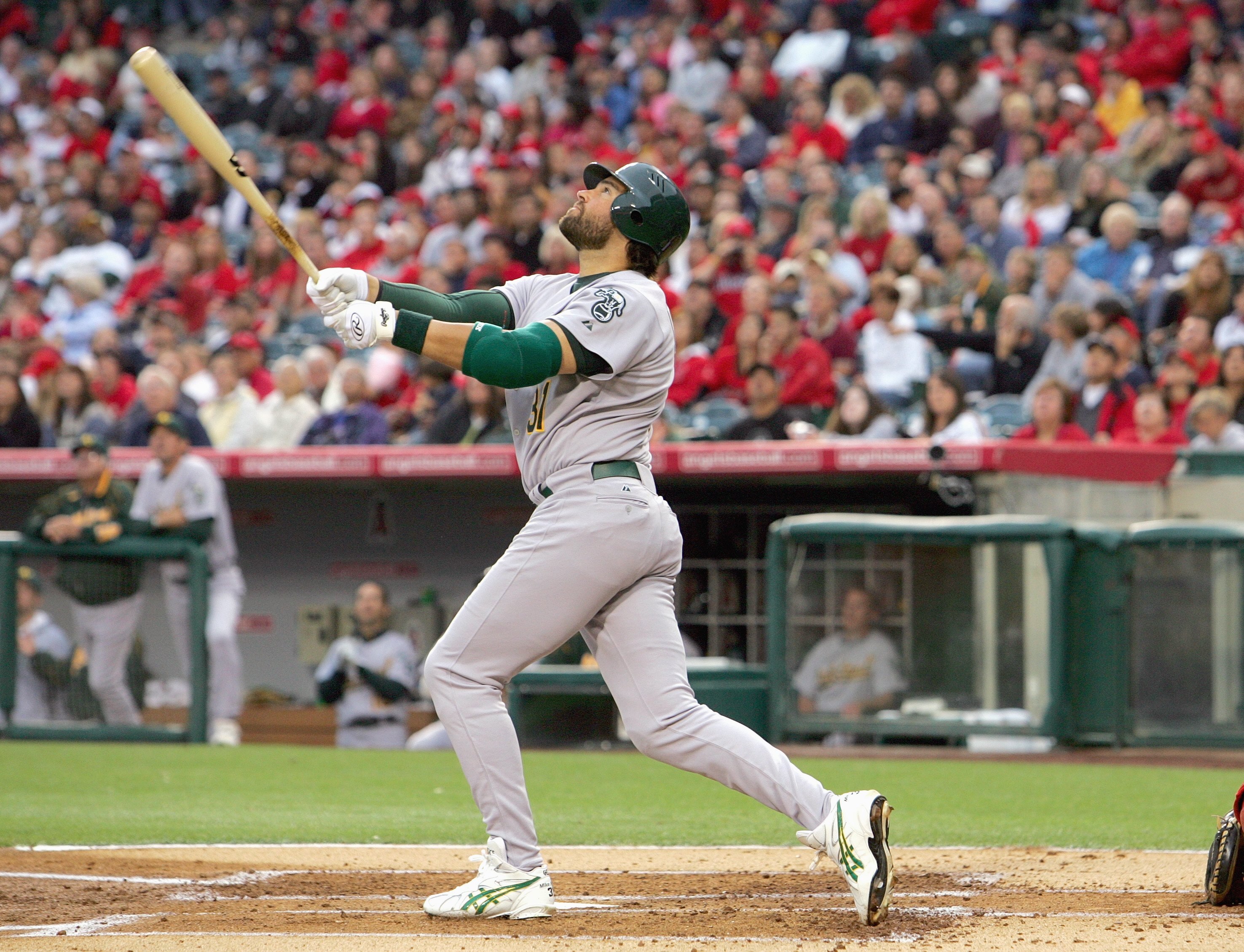 ANAHEIM, CA - APRIL 7: Mike Piazza #31 of the Oakland Athletics makes a hit during the game against the Los Angeles Angels of Anaheim at Angel Stadium on April 7, 2007 in Anaheim, California. (Photo by Stephen Dunn/Getty Images)