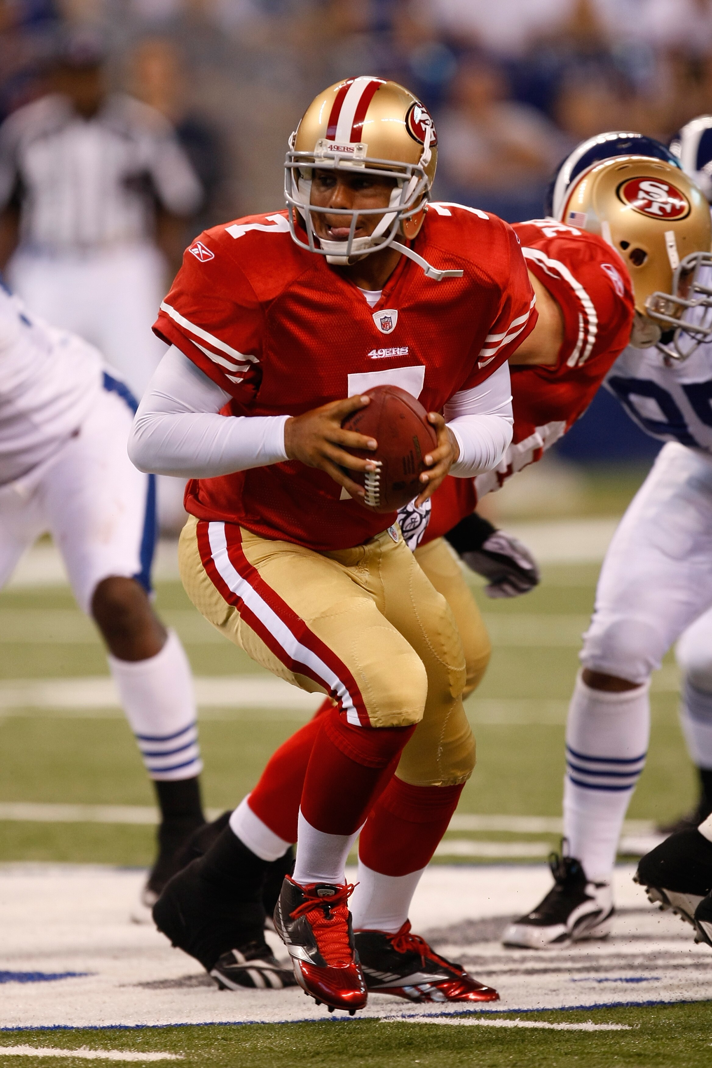 INDIANAPOLIS, IN - AUGUST 15: Nate Davis #7 of the San Francisco 49ers looks to pass during the preseason game against the Indianapolis Colts at Lucas Oil Stadium on August 15, 2010 in Indianapolis, Indiana. The 49ers defeated the Colts 37-17. (Photo by S
