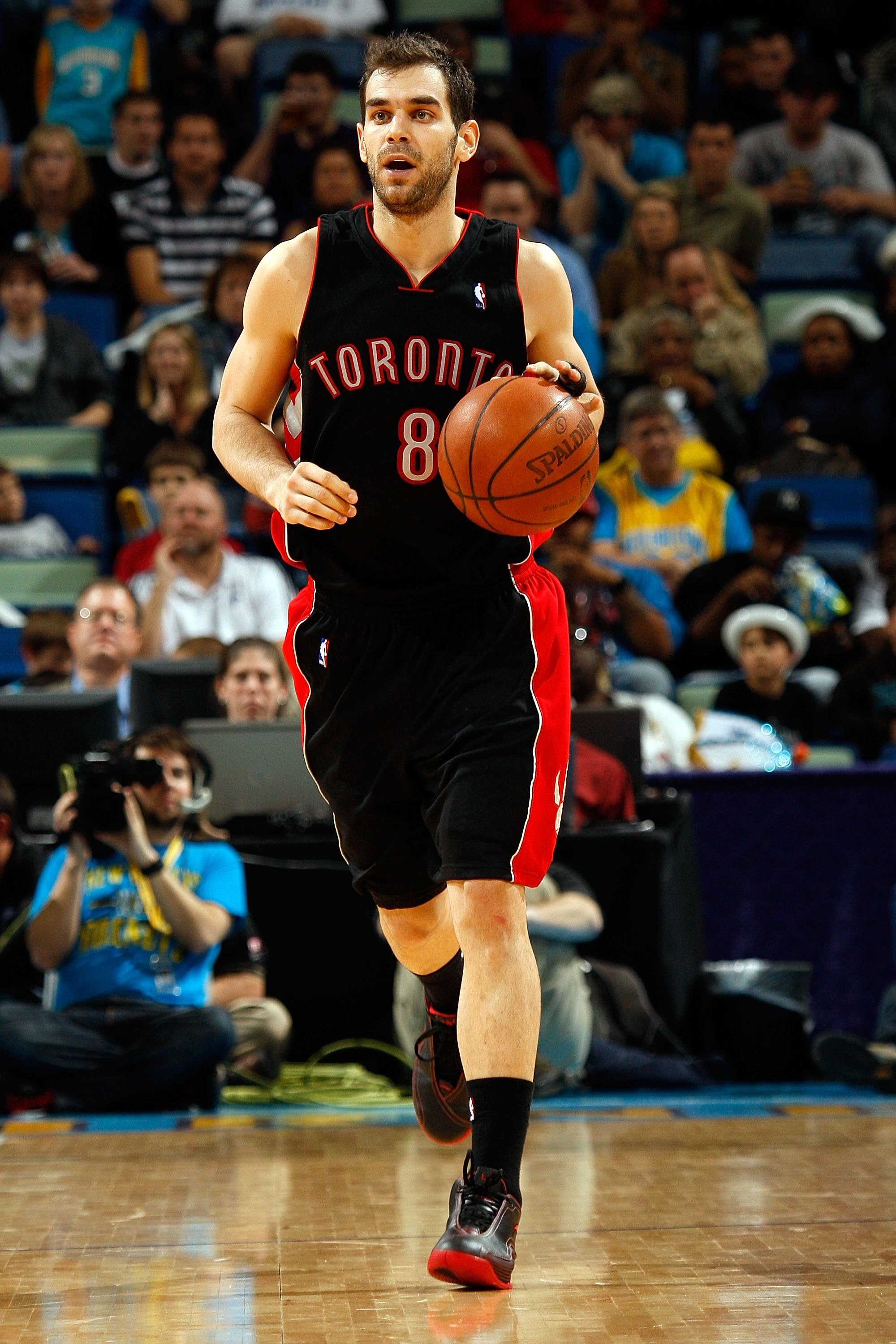 NEW ORLEANS - FEBRUARY 06:  Jose Calderon #8 of the Toronto Raptors dribbles during the game against the New Orleans Hornets on February 6, 2009 in New Orleans, Louisiana.  NOTE TO USER: User expressly acknowledges and agrees that, by downloading and/or u