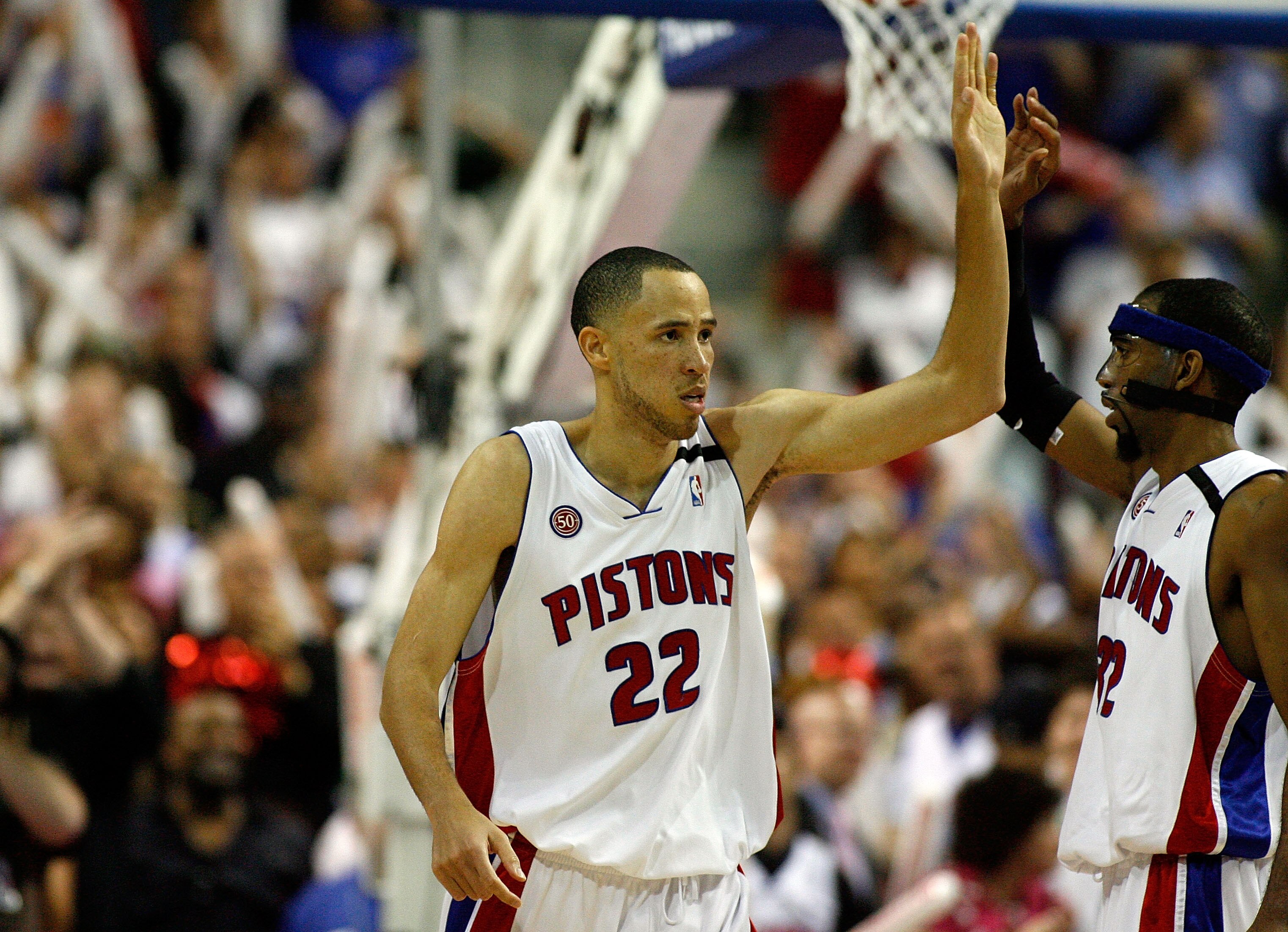 AUBURN HILLS, MI - MAY 13:  Tayshaun Prince #22 and Richard Hamilton #32 of the Detroit Pistons celebrate after Prince blocked a shot by Hedo Turkoglu #15 of the Orlando Magic in the final minute of Game Five of the Eastern Conference Semifinals during th