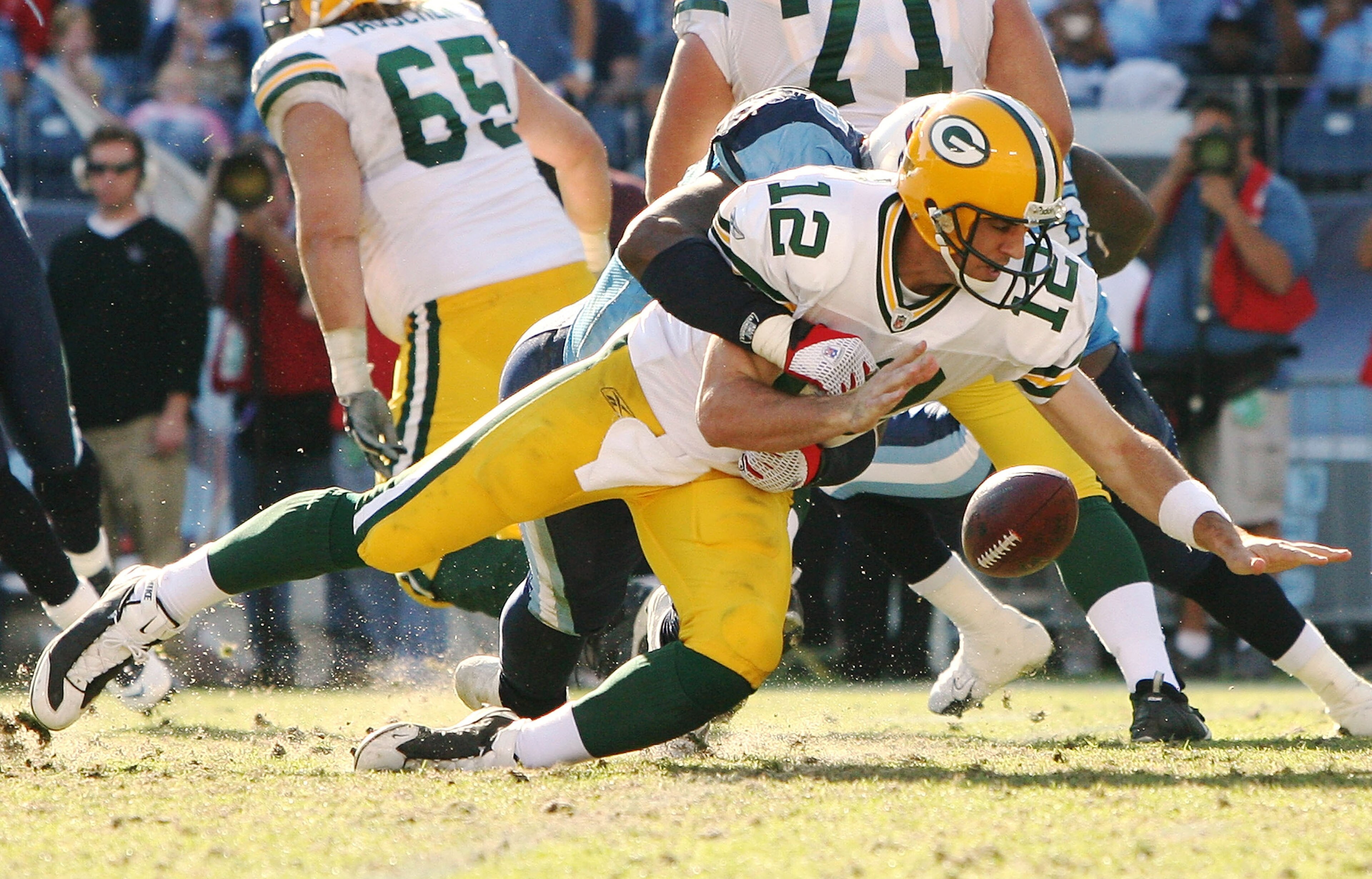 NASHVILLE, TN - NOVEMBER 02: Defensive end Jacob Ford #78 of the Tennessee Titans cause a fumble when he sacks quarterback Aaron Rodgers #12 of the Green Bay Packers at LP Field on November 2, 2008 in Nashville, Tennessee. The Titans defeated the Packers NASHVILLE, TN - NOVEMBER 02: Defensive end Jacob Ford #78 of the Tennessee Titans cause a fumble when he sacks quarterback Aaron Rodgers #12 of the Green Bay Packers at LP Field on November 2, 2008 in Nashville, Tennessee. The Titans defeated the Packers
