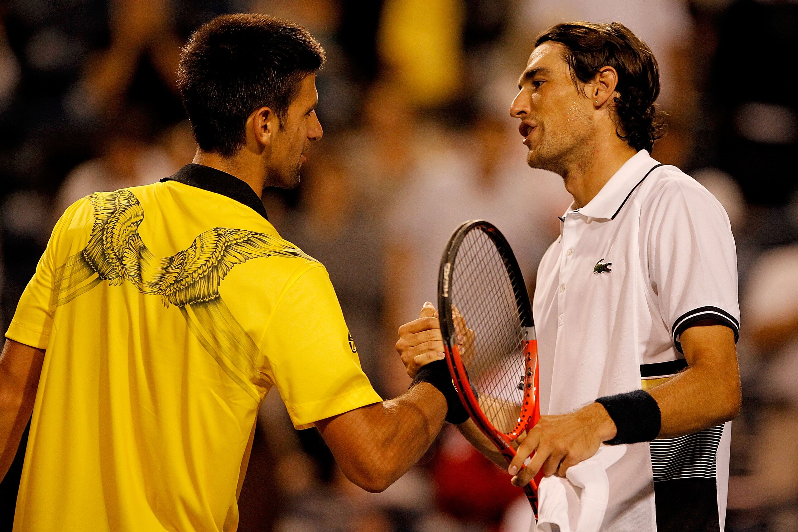 TORONTO, ON - AUGUST 13:  Novak Djokovic of Serbia is congratulated by Jeremy Chardy of France after their match during the quarterfinals of the Rogers Cup at the Rexall Centre on August 13, 2010 in Toronto, Canada.  (Photo by Matthew Stockman/Getty Image