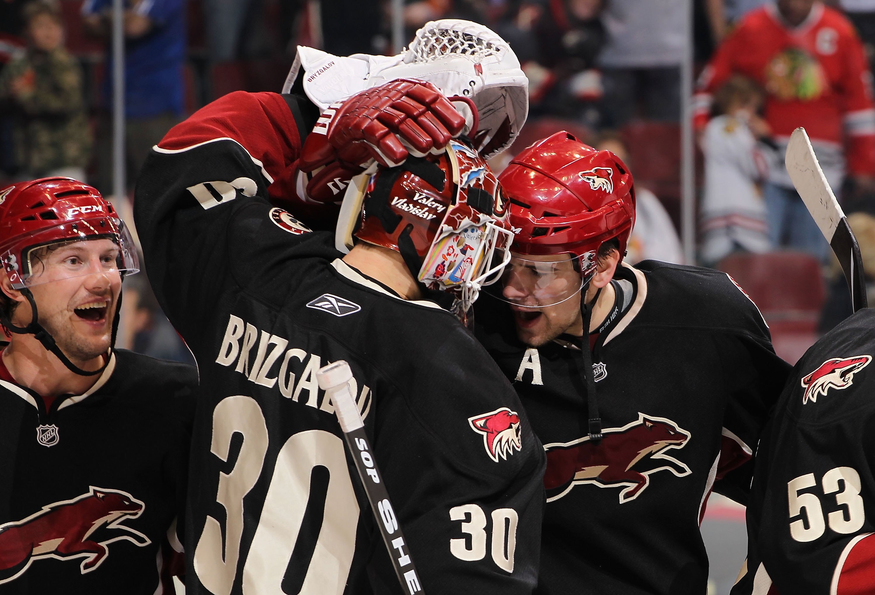 GLENDALE, AZ - MARCH 20:  Shane Doan #19, Ilya Bryzgalov#30 and Zbynek Michalek #4 of the Phoenix Coyotes celebrate after winning the NHL game against the Chicago Blackhawks at Jobing.com Arena on March 20, 2010 in Glendale, Arizona. The Coyotes defeated