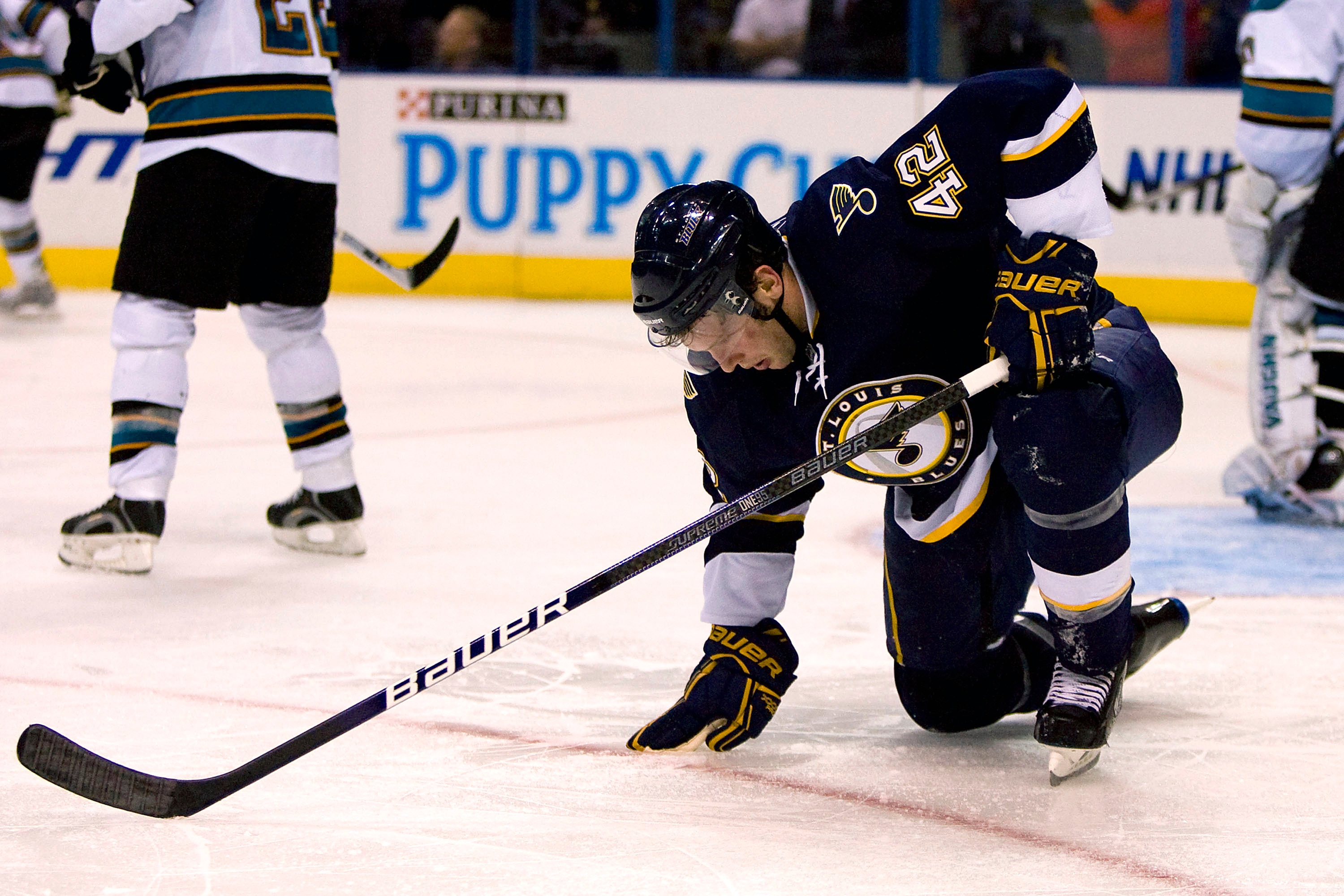 ST. LOUIS - NOVEMBER 14: David Backes #42 of the St. Louis Blues is injured against the San Jose Sharks at the Scottrade Center on November 14, 2009 in St. Louis, Missouri.  (Photo by Dilip Vishwanat/Getty Images)