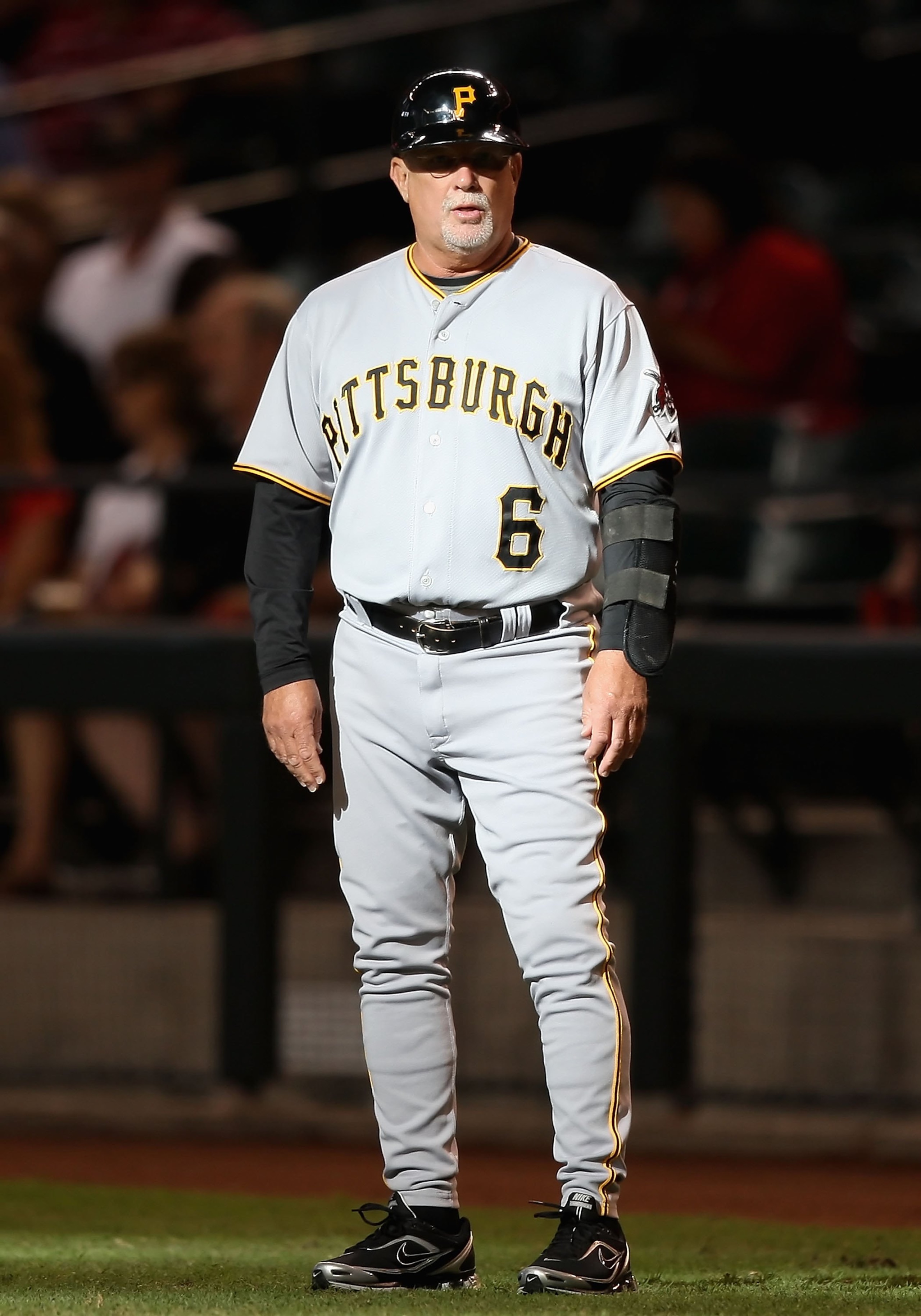 PHOENIX - JULY 25:  First base coach Perry Hill #6 of the Pittsburgh Pirates during the major league baseball game against the Arizona Diamondbacks at Chase Field on July 25, 2009 in Phoenix, Arizona. The Diamondbacks defeated the Pirates 7-0.  (Photo by 