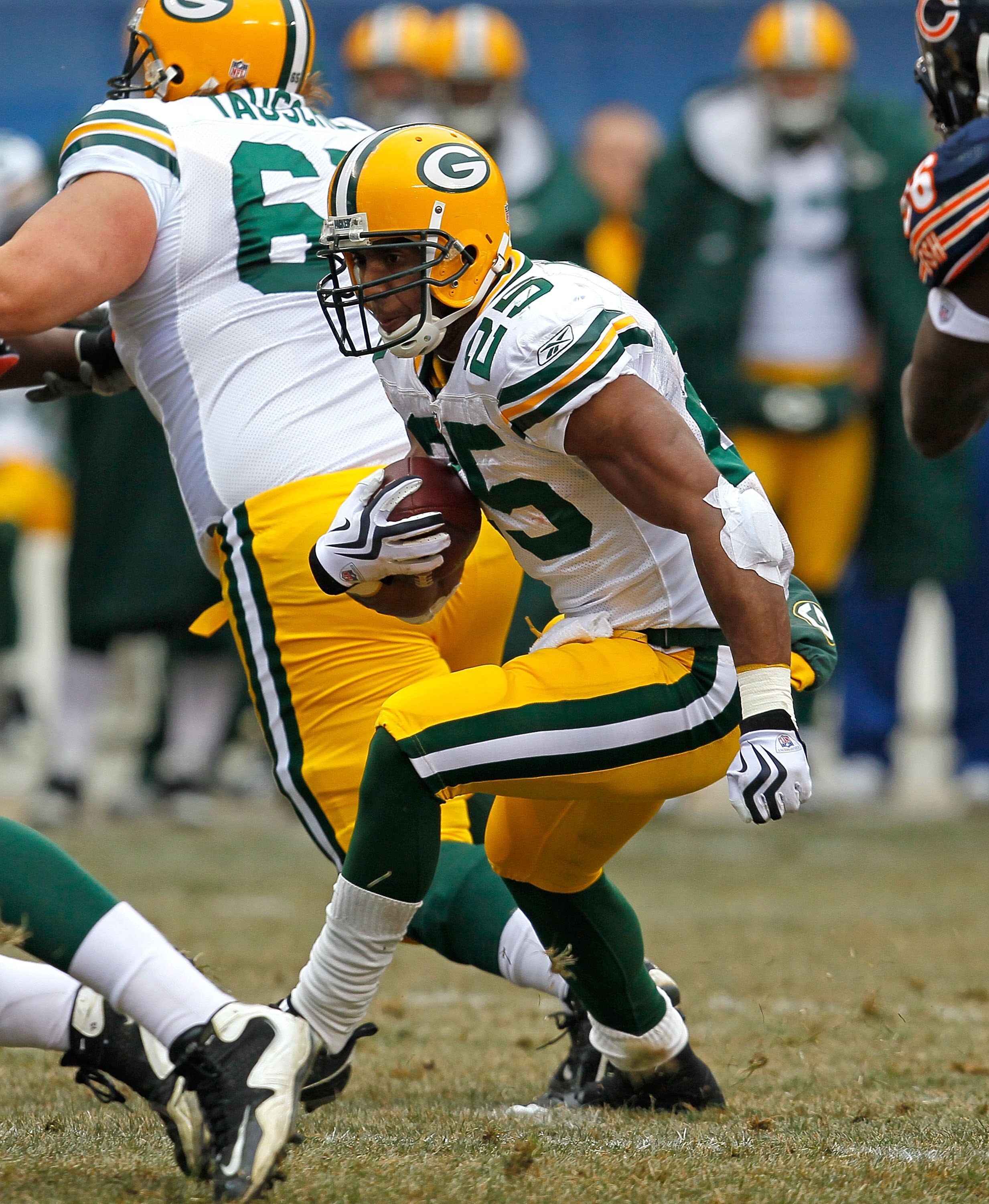 CHICAGO - DECEMBER 13: Ryan Grant #25 of the Green Bay Packers runs against the Chicago Bears at Soldier Field on December 13, 2009 in Chicago, Illinois. The Packers defeated the Bears 21-14. (Photo by Jonathan Daniel/Getty Images)