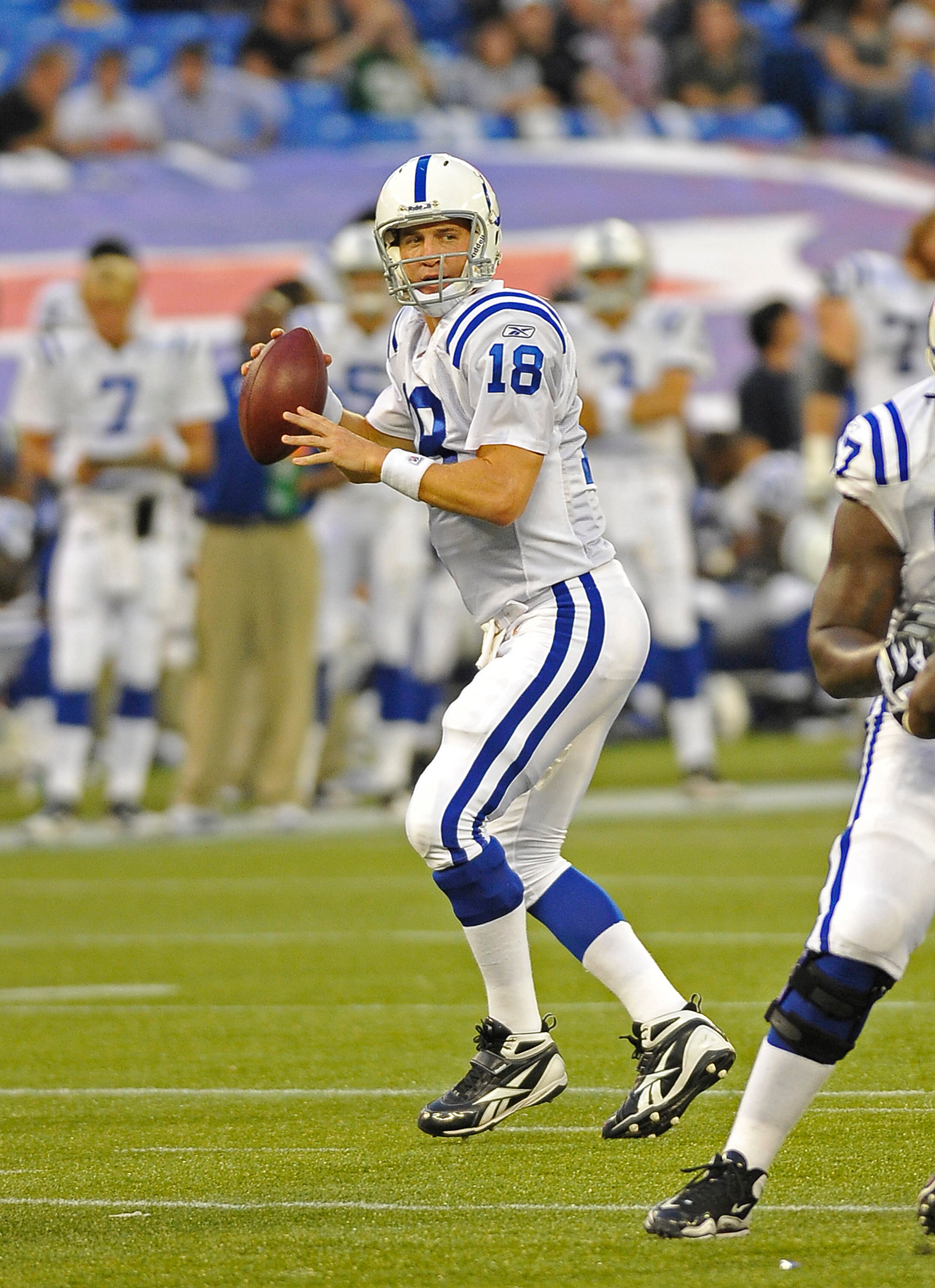 TORONTO - AUGUST 19:  Peyton Manning #18  of the Indianapolis Colts looks to pass during game action against the Buffalo Bills August 19, 2010 at the Rogers Centre in Toronto, Ontario, Canada. (Photo by Brad White/Getty Images)
