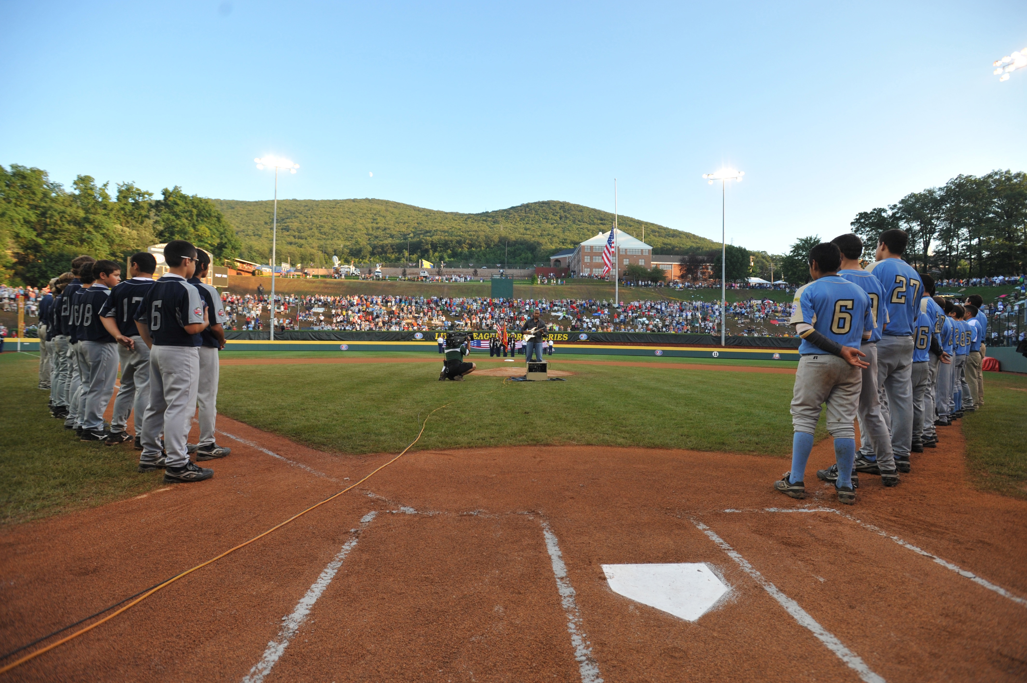 WILLIAMSPORT, PA - AUGUST 29: Bernie Williams plays the national anthem before the game between the West (California) and the the Southwest (Texas) in the US final at Lamade Stadium on August 29, 2009 in Williamsport, Pennsylvania. California defeated Tex