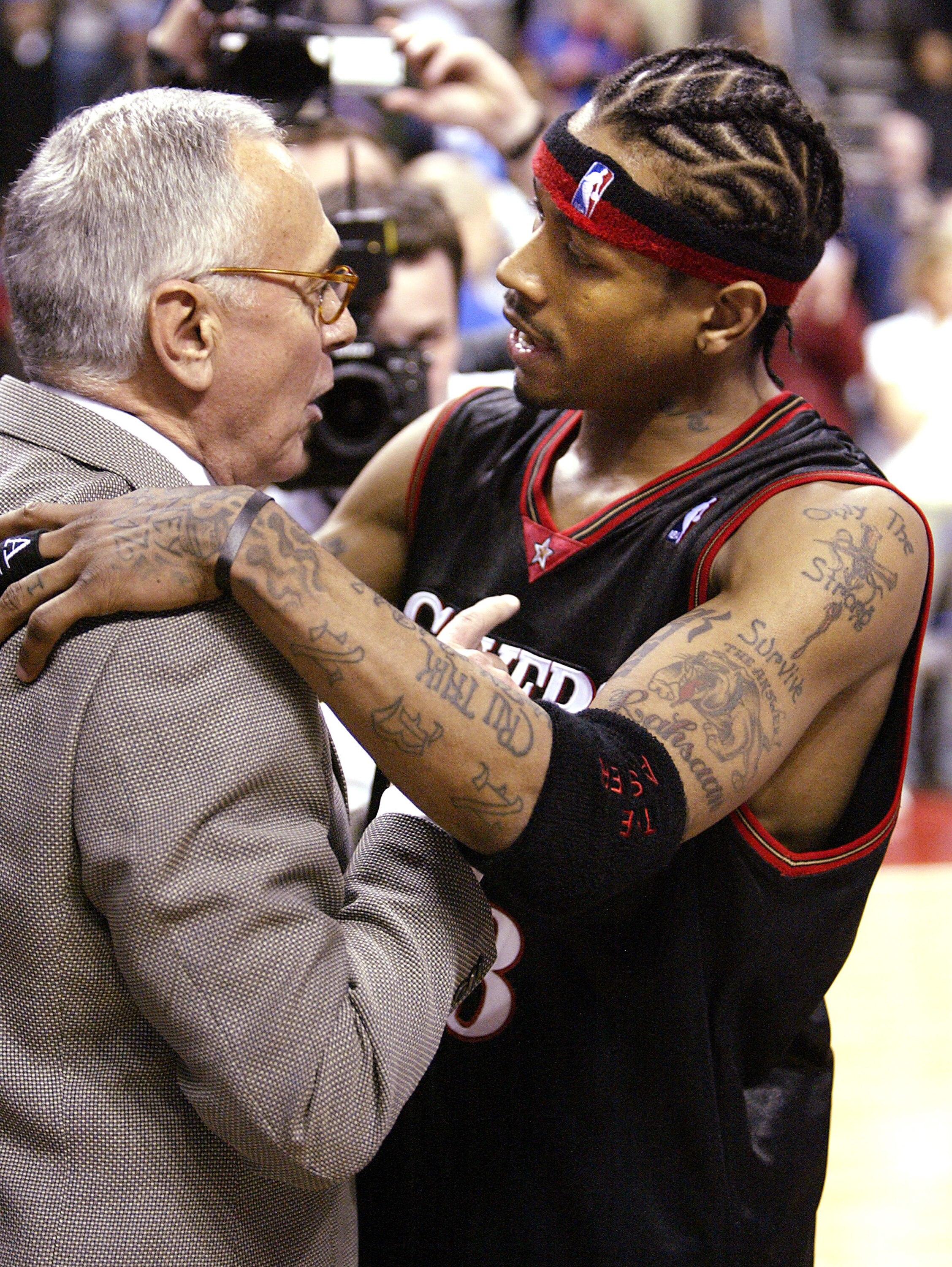 AUBURN HILLS, MI - MAY 3: Allen Iverson #3 of the Philadelphia 76ers embraces Larry Brown of the Detroit Pistons after Game five of the Eastern Conference Quarterfinals during the 2005 NBA Playoffs on May 3, 2005 at The Palace in Auburn Hills, Michigan. T