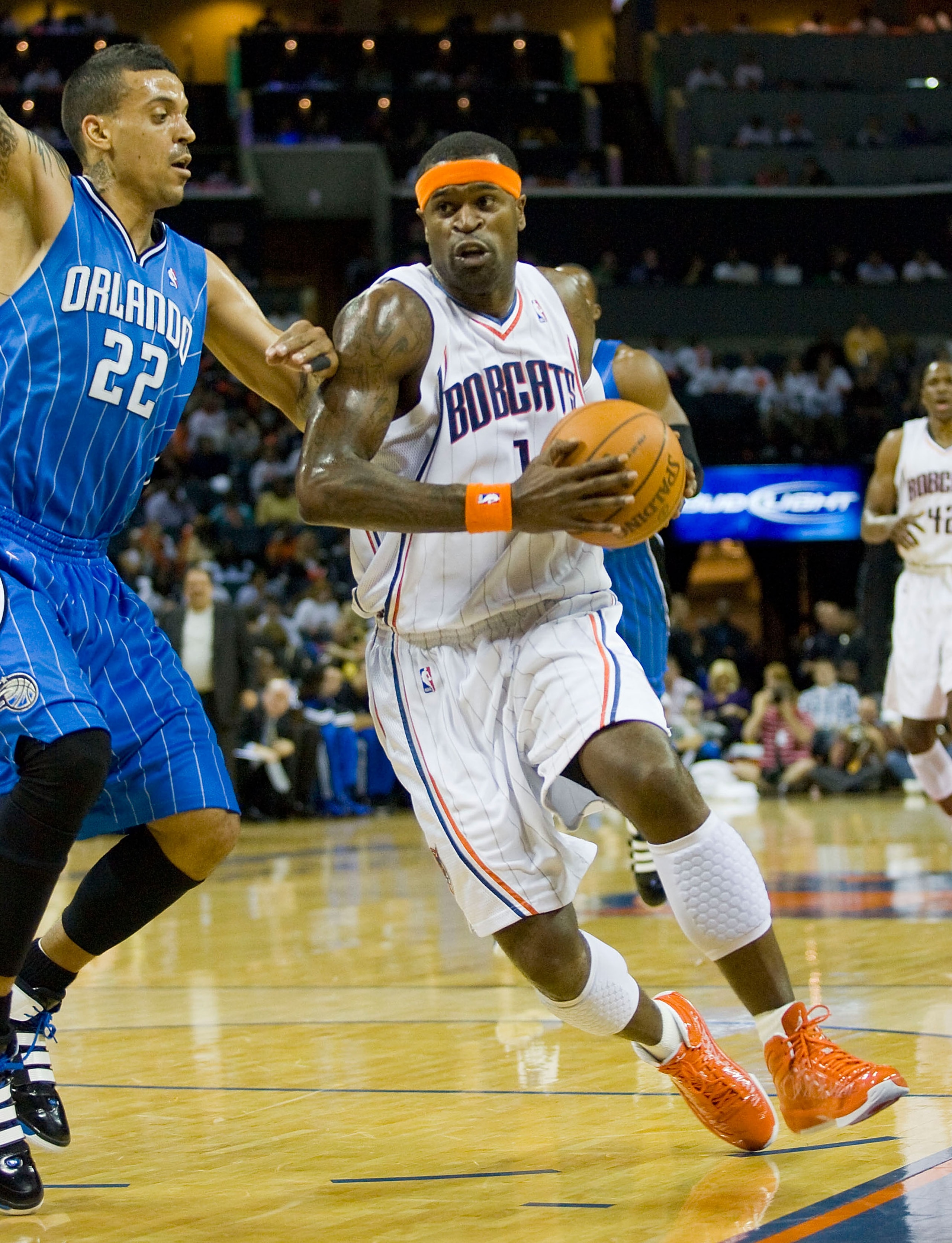 CHARLOTTE, NC - APRIL 26:  Stephen Jackson #1 of the Charlotte Bobcats attempts to drive past Matt Barnes #22 of the Orlando Magic during first quarter action in Game Four of the Eastern Conference Quarterfinals during the 2010 NBA Playoffs at Time Warner