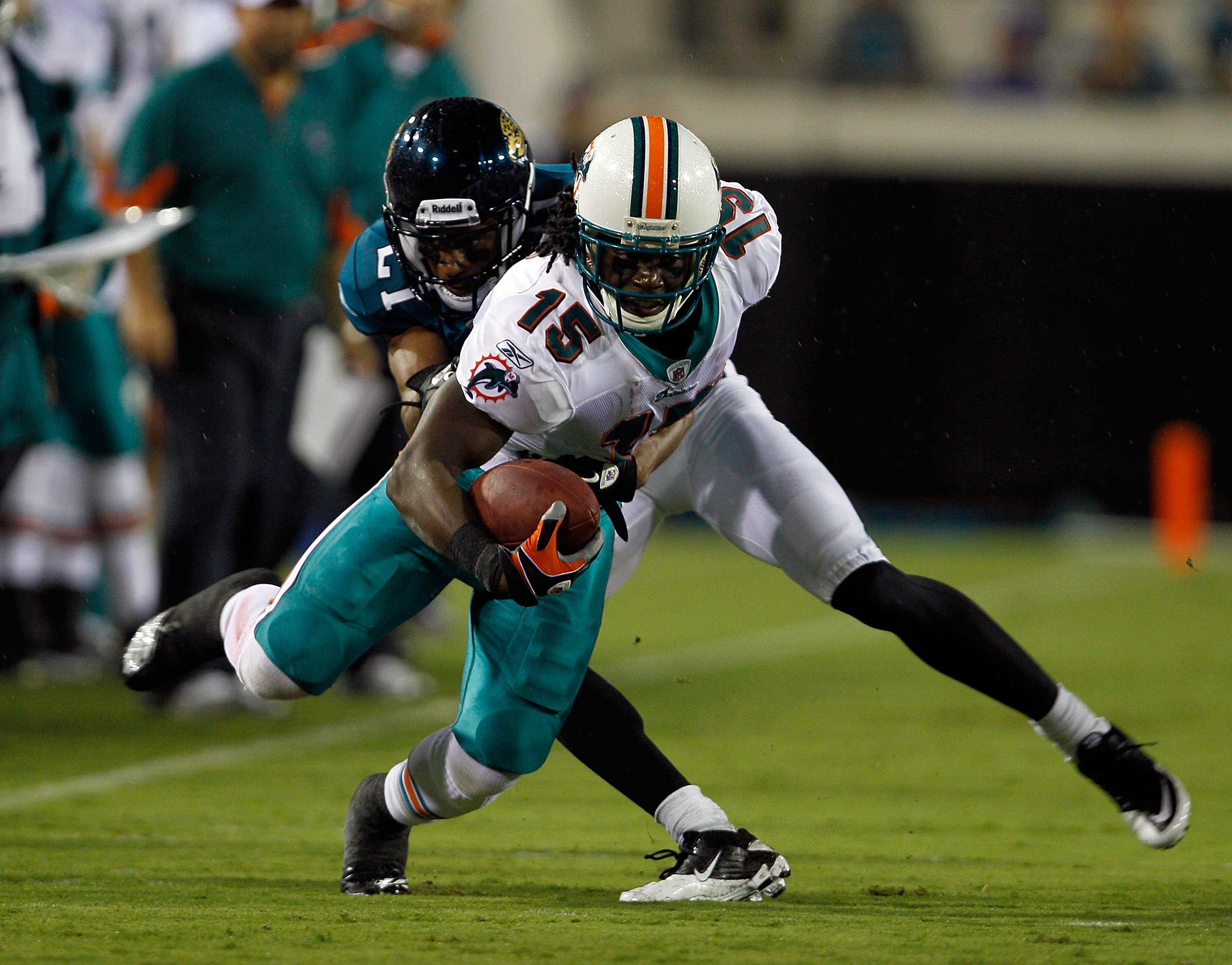 JACKSONVILLE, FL - AUGUST 21:  Anthony Fasano #80 of the Miami Dolphins runs after a reception during the preseason game against the Jacksonville Jaguars at EverBank Field on August 21, 2010 in Jacksonville, Florida.  (Photo by Sam Greenwood/Getty Images)