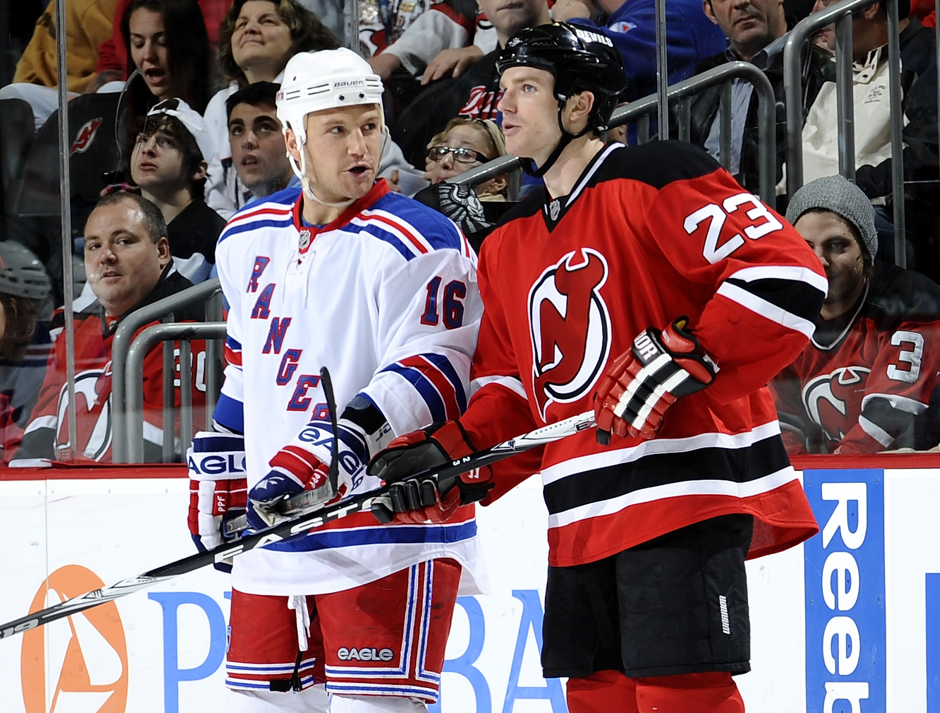 NEWARK, NJ - MARCH 25:  Sean Avery #16 of the New York Rangers talks to David Clarkson #23 of the New Jersey Devils  at the Prudential Center on March 25, 2010 in Newark, New Jersey.  The Rangers won 4-3 in a shootout. (Photo by Jeff Zelevansky/Getty Imag