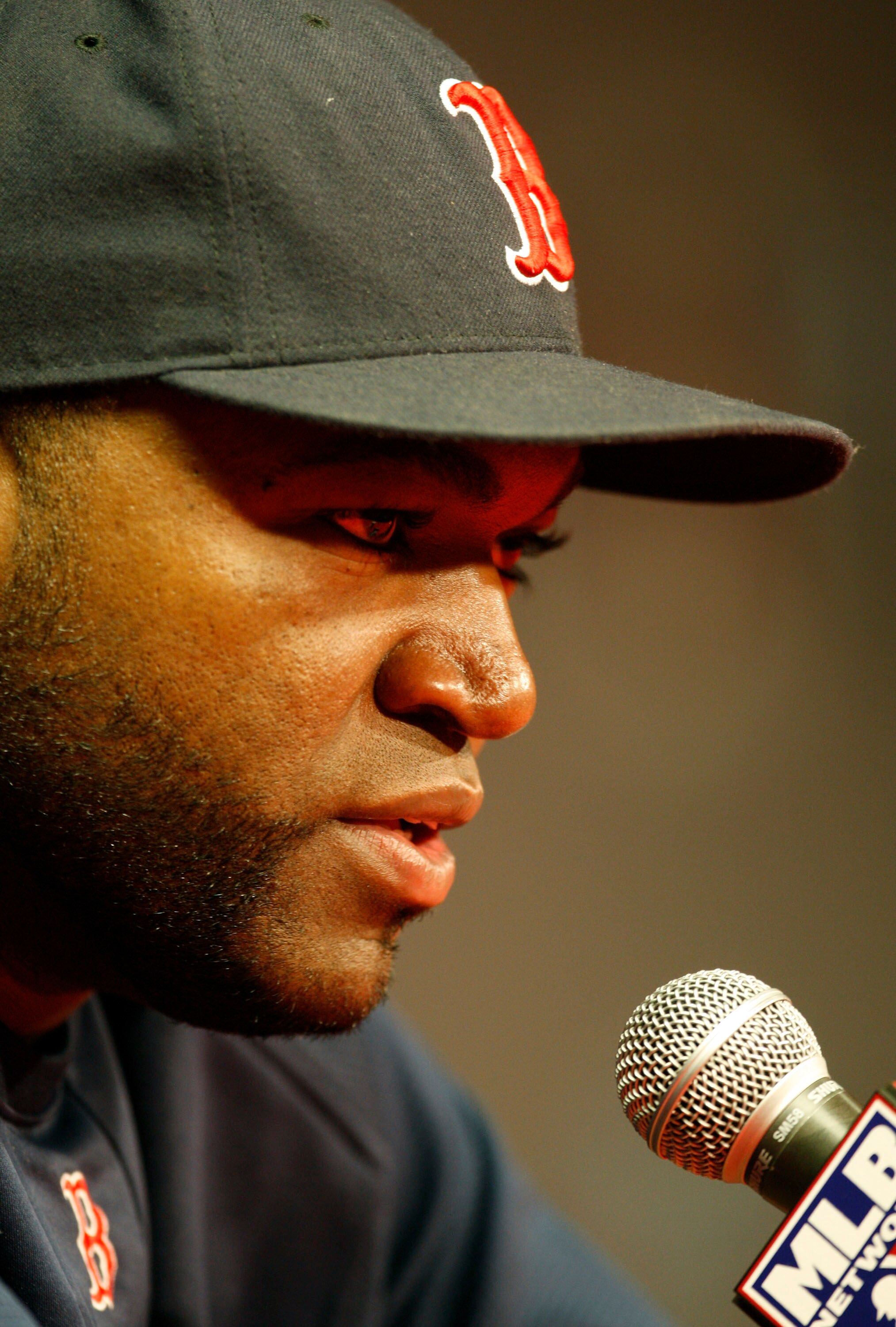 ANAHEIM, CA - OCTOBER 09:  David Ortiz #34 of the Boston Red Sox speaks to the media before Game Two of the ALDS against the Los Angeles Angels of Anaheim during the 2009 MLB Playoffs at Angel Stadium on October 9, 2009 in Anaheim, California. (Photo by L