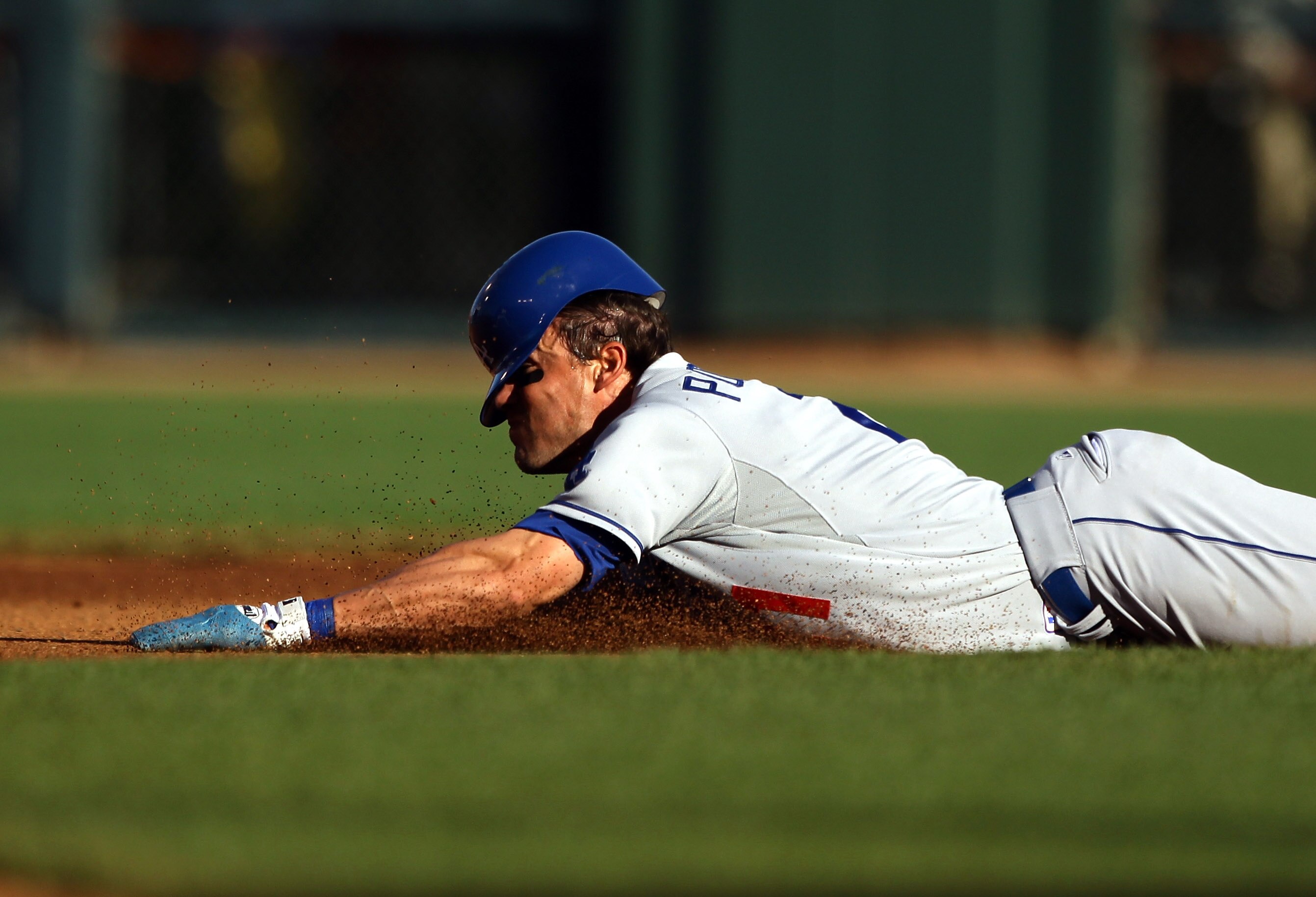 SAN FRANCISCO - AUGUST 01:  Scott Podsednik #21 of the Los Angeles Dodgers slides into second base during their game against the San Francisco Giants at AT&T Park on August 1, 2010 in San Francisco, California.  (Photo by Ezra Shaw/Getty Images)