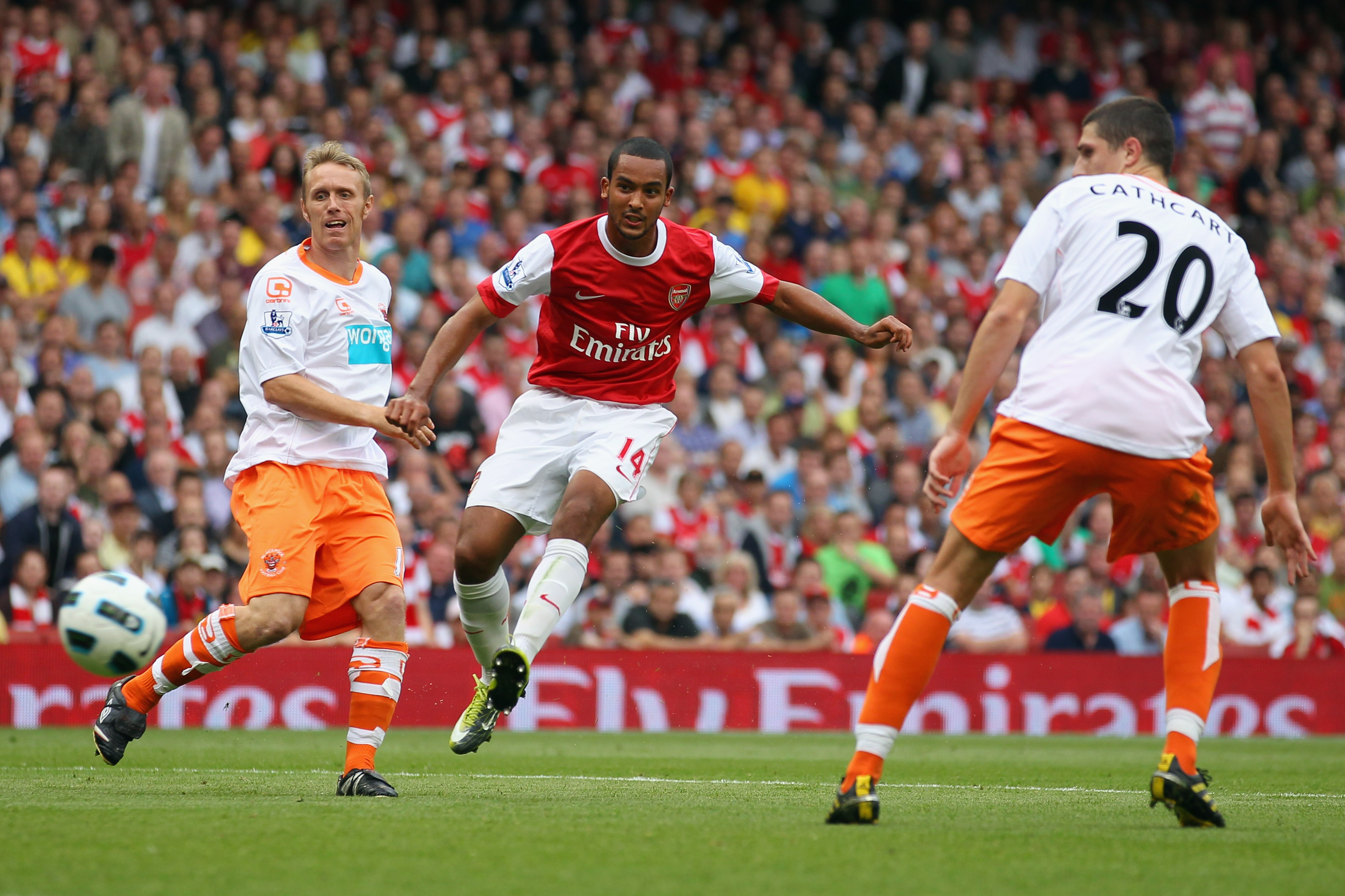 LONDON, ENGLAND - AUGUST 21:  Theo Walcott of Arsenal scores his third goal for a hat-trick during the Barclays Premier League match between Arsenal and Blackpool at The Emirates Stadium on August 21, 2010 in London, England.  (Photo by Clive Rose/Getty I
