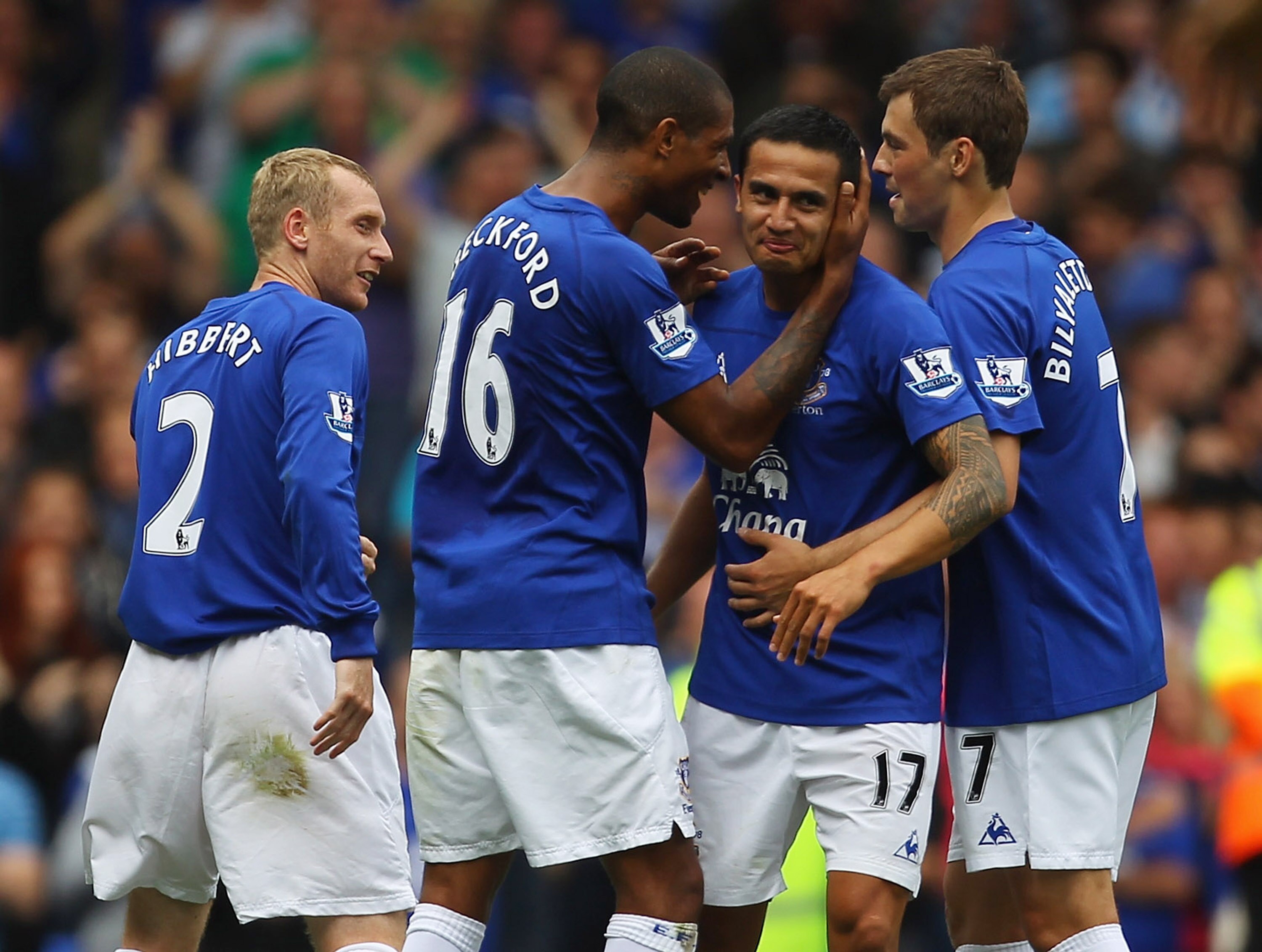 LIVERPOOL, ENGLAND - AUGUST 21:  Tim Cahill of Everton celebrates with Jermaine Beckford after scoring the opening goal during the Barclays Premier League match between Everton and Wolverhampton Wanderers at Goodison Park on August 21, 2010 in Liverpool,