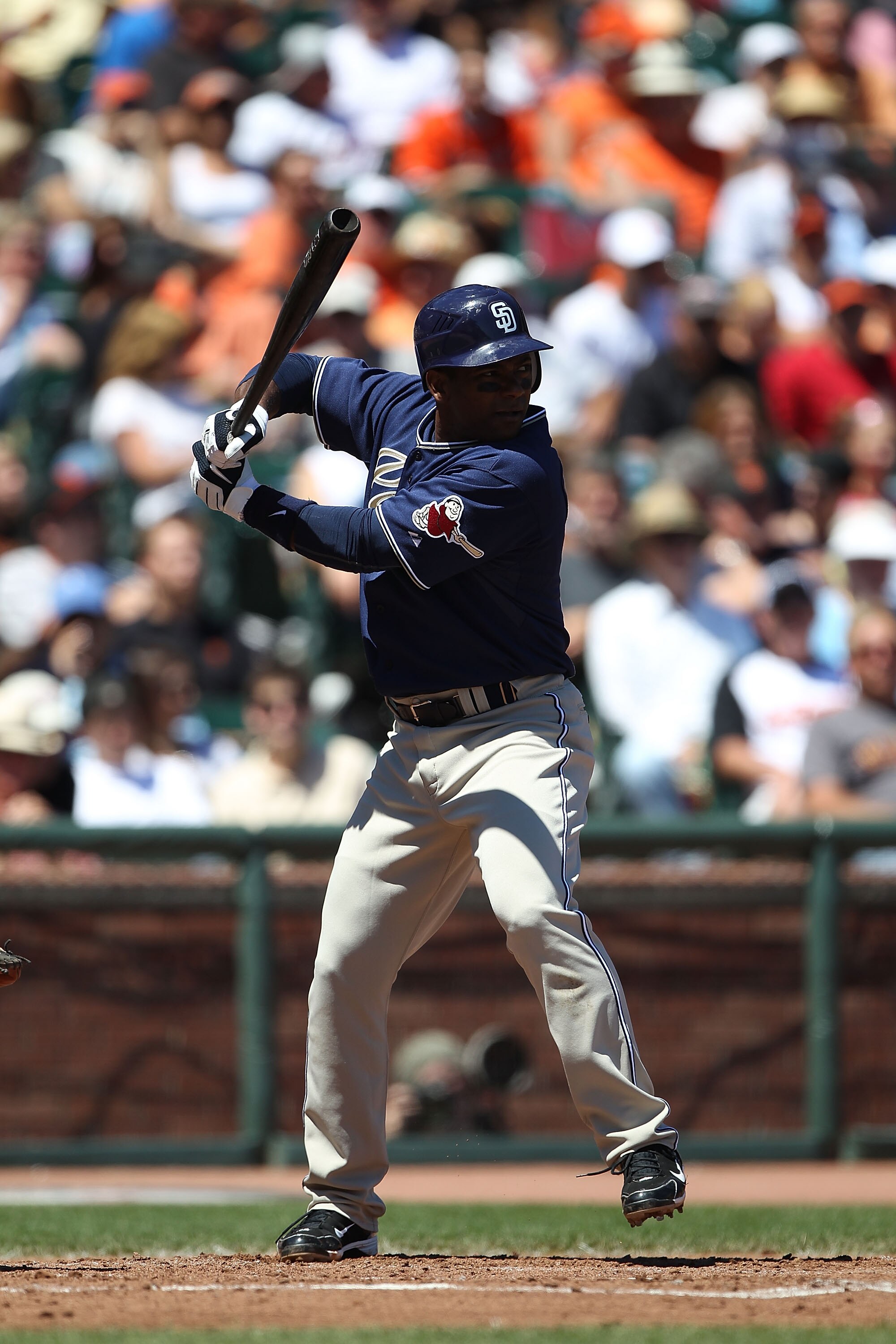 SAN FRANCISCO - AUGUST 14:  Miguel Tejada #10  of the San Diego Padres bats against the San Francisco Giants during an MLB game at AT&T Park on August 14, 2010 in San Francisco, California.  (Photo by Jed Jacobsohn/Getty Images)