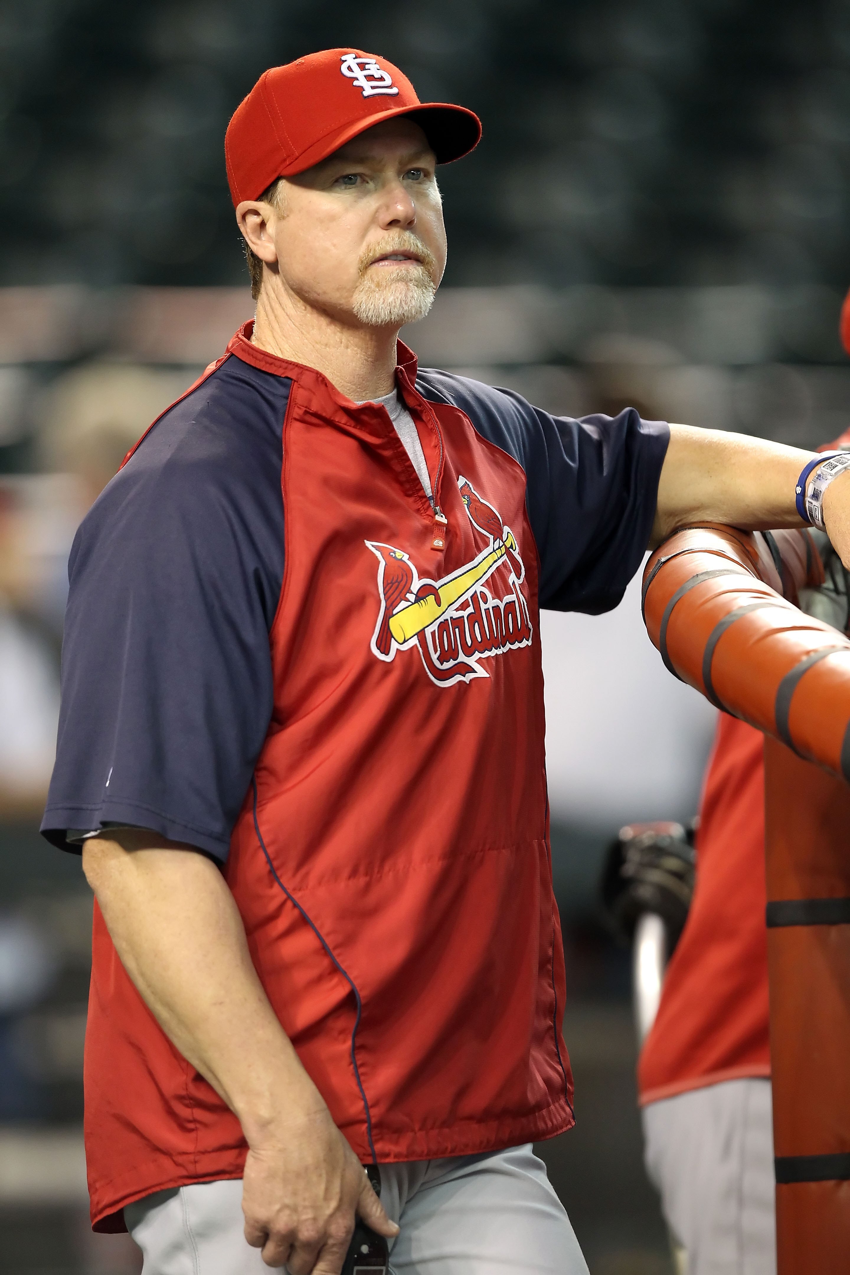 PHOENIX - JUNE 11:  Batting coach Mark McGwire #25 of the St. Louis Cardinals before the Major League Baseball game against the Arizona Diamondbacks at Chase Field on June 11, 2010 in Phoenix, Arizona. The Cardinals defeated the Diamondbacks 5-2.  (Photo 