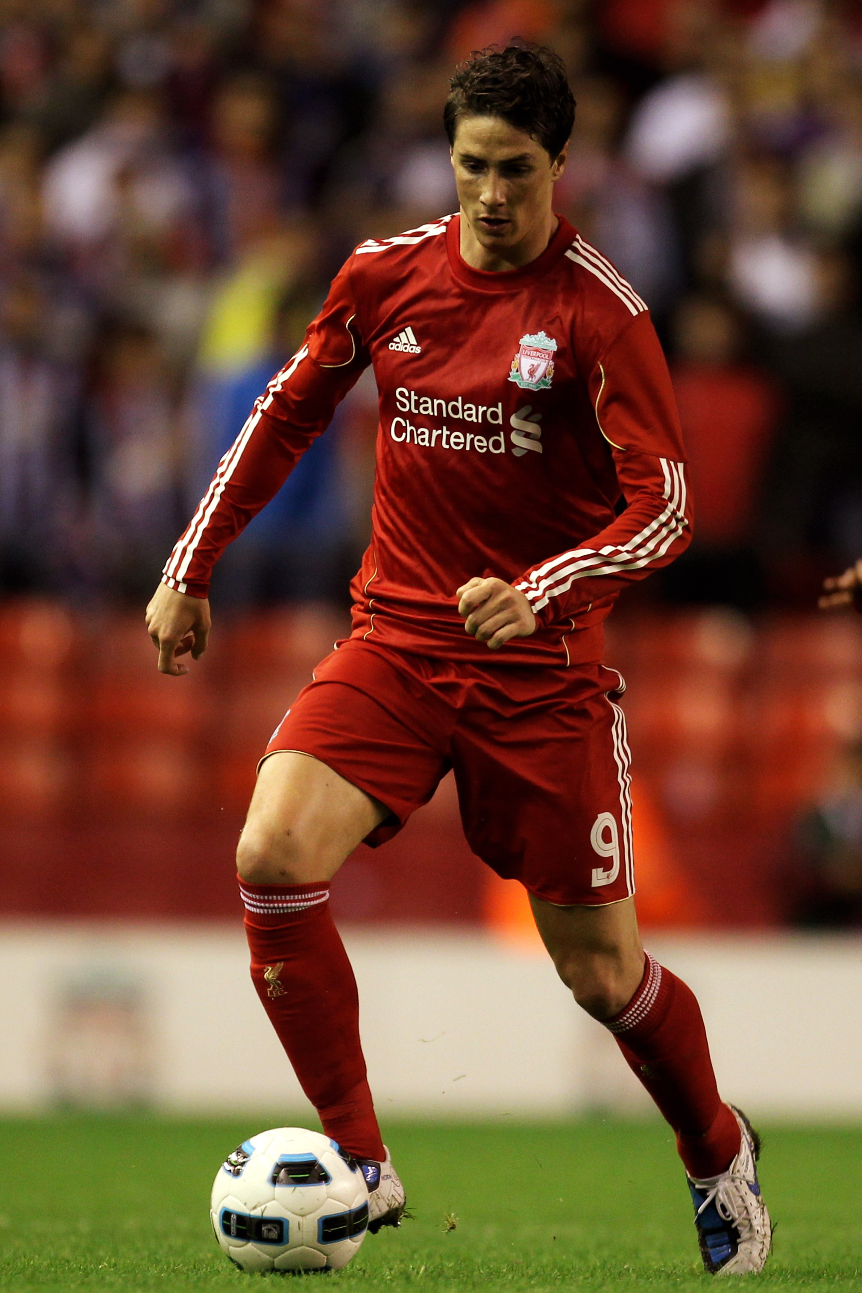 LIVERPOOL, ENGLAND - AUGUST 19:  Fernando Torres of Liverpool in action during the UEFA Europa League play-off first leg match beteween Liverpool and Trabzonspor at Anfield on August 19, 2010 in Liverpool, England.  (Photo by Alex Livesey/Getty Images)