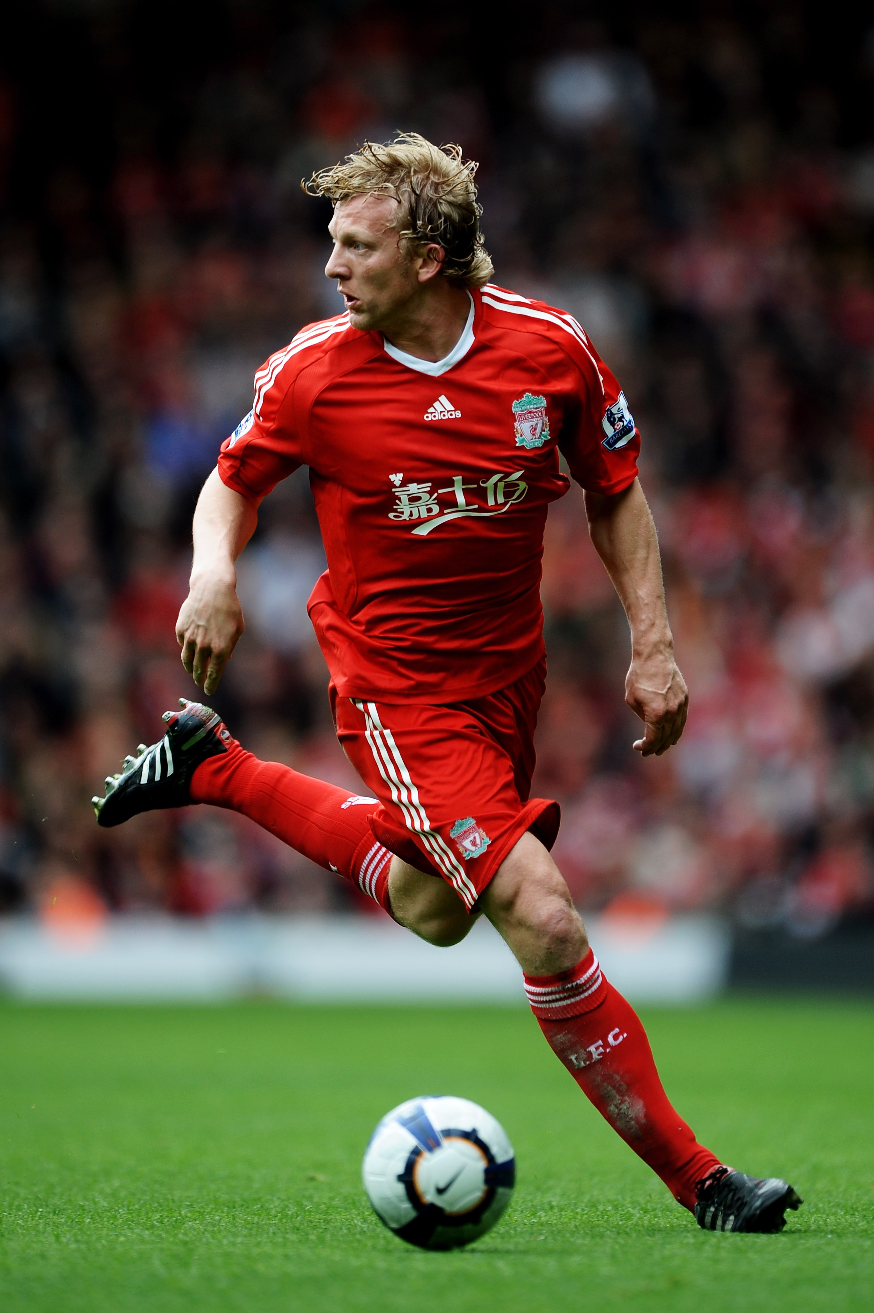 LIVERPOOL, ENGLAND - MAY 02:  Dirk Kuyt of Liverpool runs with the ball during the Barclays Premier League match between Liverpool and Chelsea at Anfield on May 2, 2010 in Liverpool, England.  (Photo by Laurence Griffiths/Getty Images)