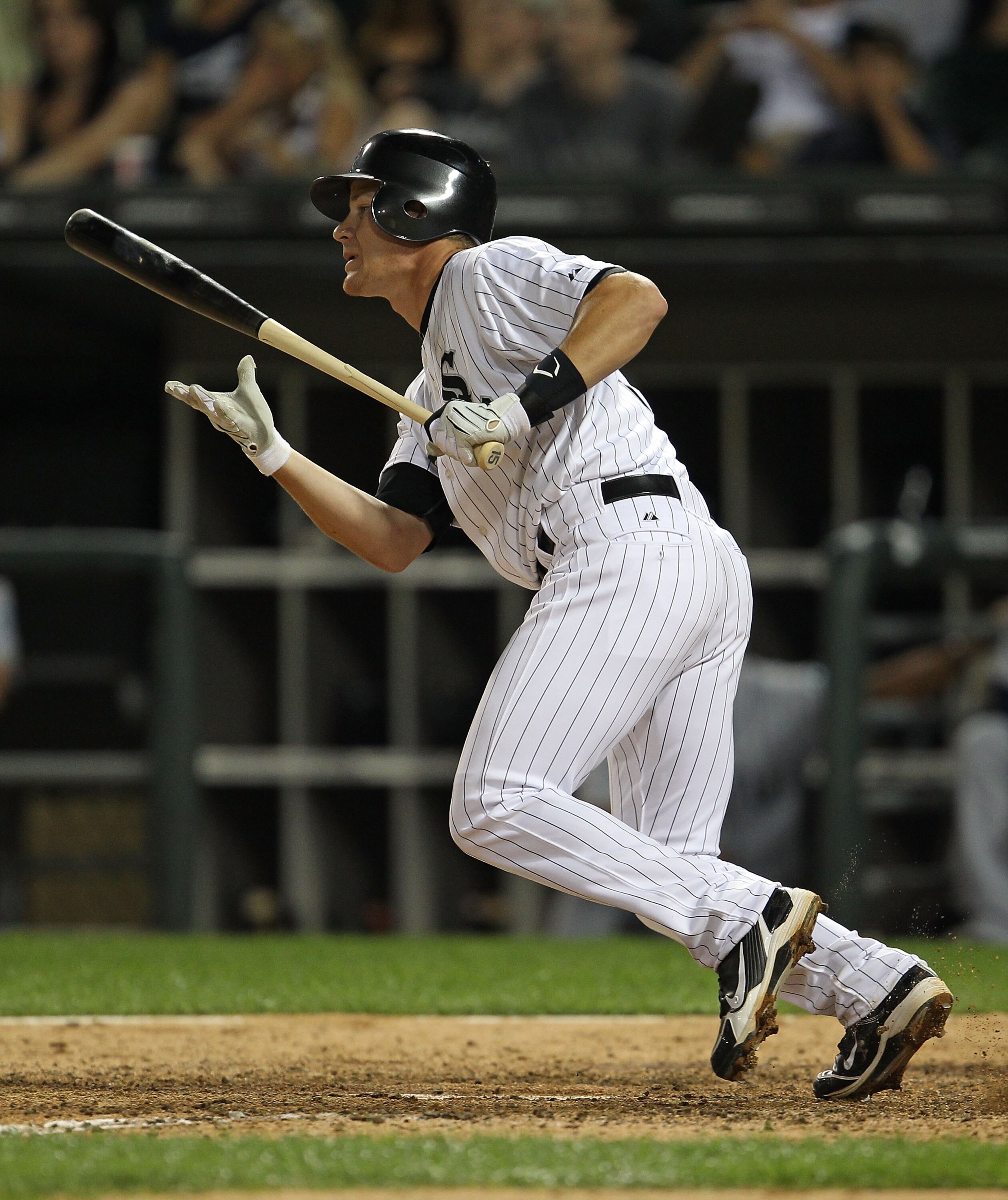 CHICAGO - JULY 26:  Gordon Beckham #15 of the Chicago White Sox runs after hitting the ball against the Seattle Mariners at U.S. Cellular Field on July 26, 2010 in Chicago, Illinois. The White Sox defeated the Mariners 6-1. (Photo by Jonathan Daniel/Getty