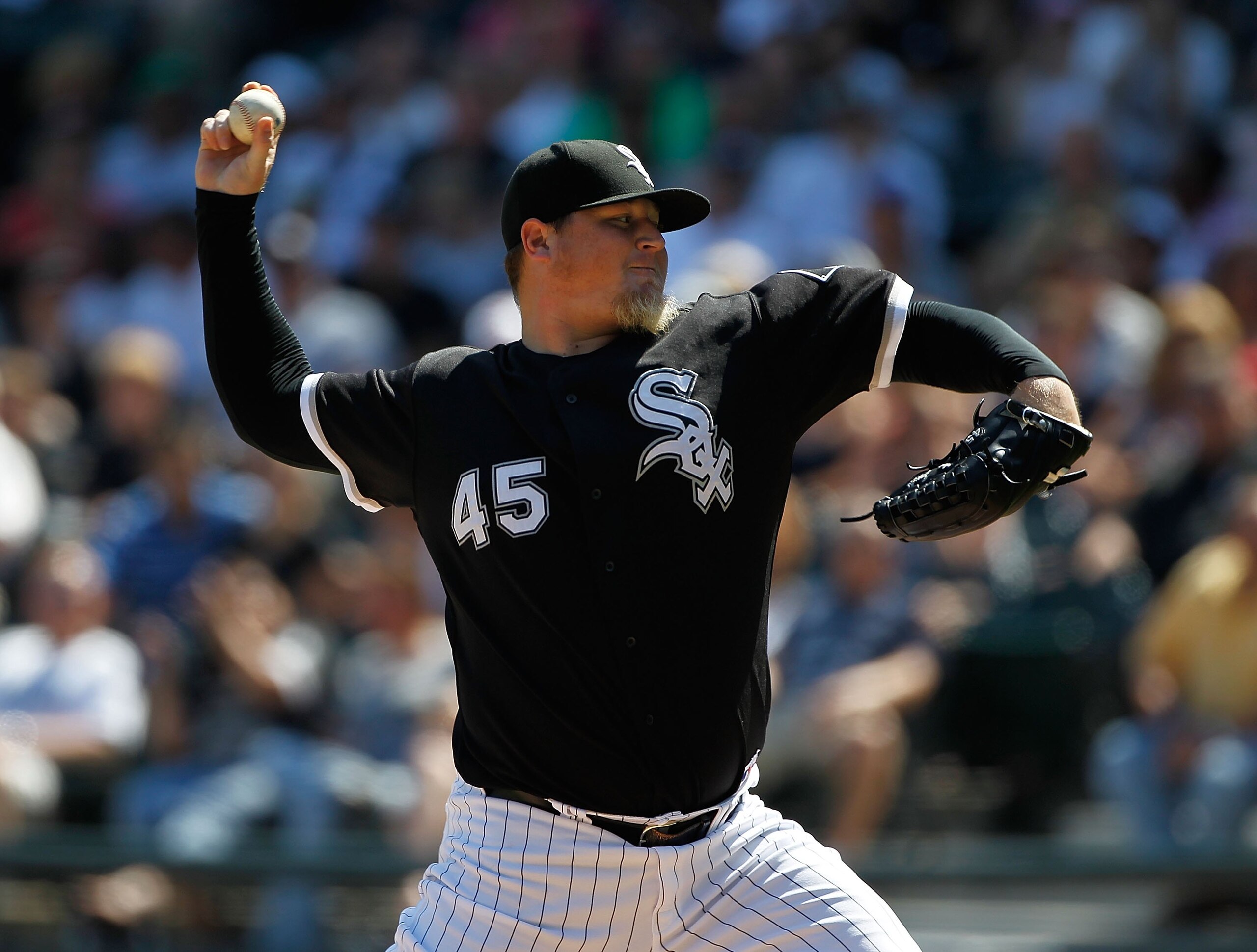 CHICAGO - JUNE 24: Bobby Jenks #45 of the Chicago White Sox pitches in the 9th inning against the Atlanta Braves to record a save at U.S. Cellular Field on June 24, 2010 in Chicago, Illinois. The White defeated the Braves 2-0. (Photo by Jonathan Daniel/Ge