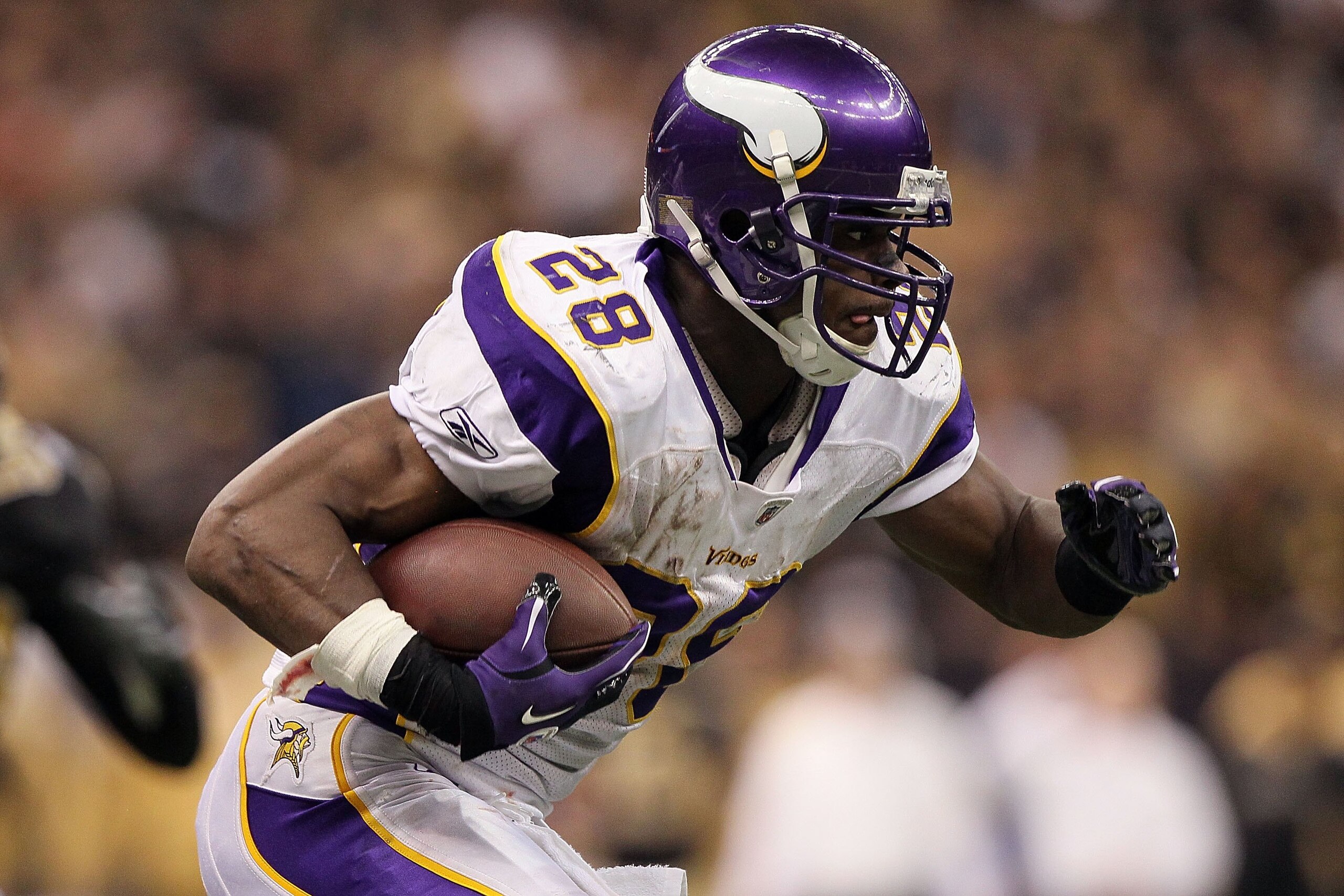 NEW ORLEANS - JANUARY 24:  Adrian Peterson #28 of the Minnesota Vikings runs the ball against the New Orleans Saints during the NFC Championship Game at the Louisiana Superdome on January 24, 2010 in New Orleans, Louisiana.  (Photo by Jed Jacobsohn/Getty